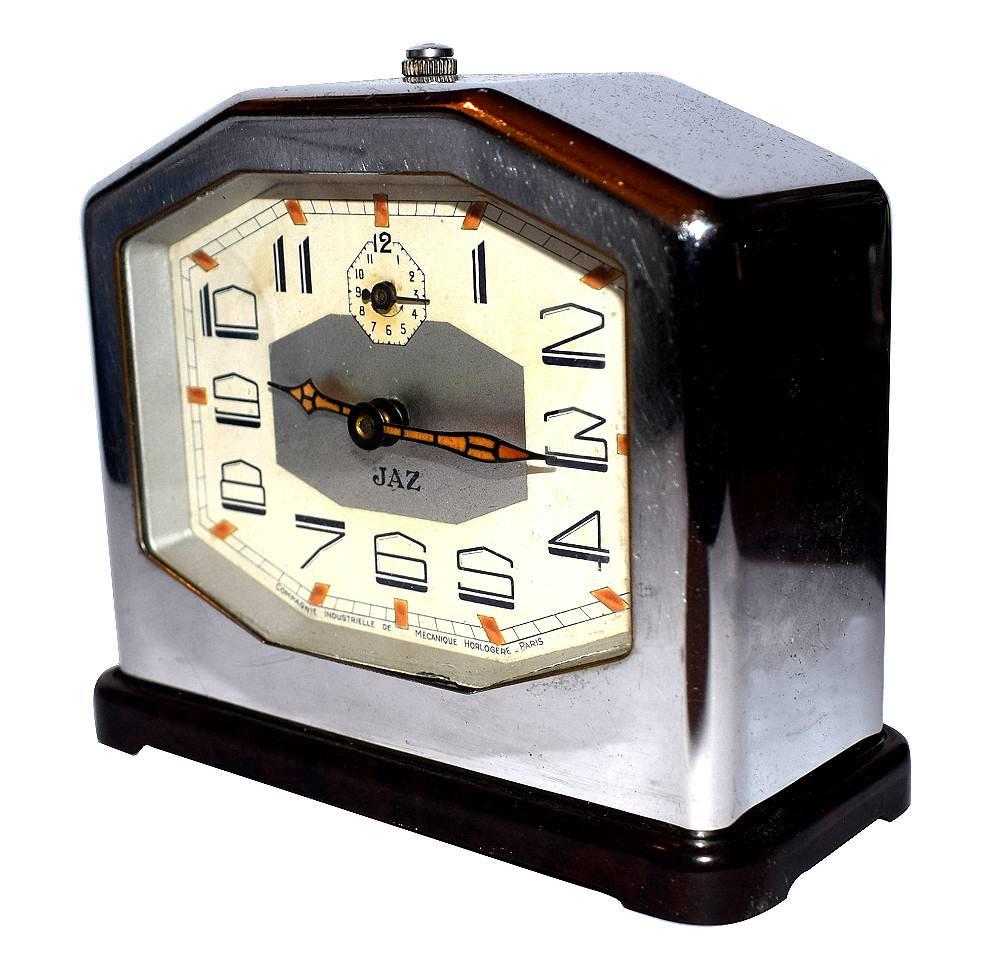Superb 1930s, Art Deco chrome and bakelite clock made by the JAZ company. This clock is in remarkably good condition. Often these clocks are found with severe chrome tarnishing or pitting but this beauty seems to have stood the test of time (pun