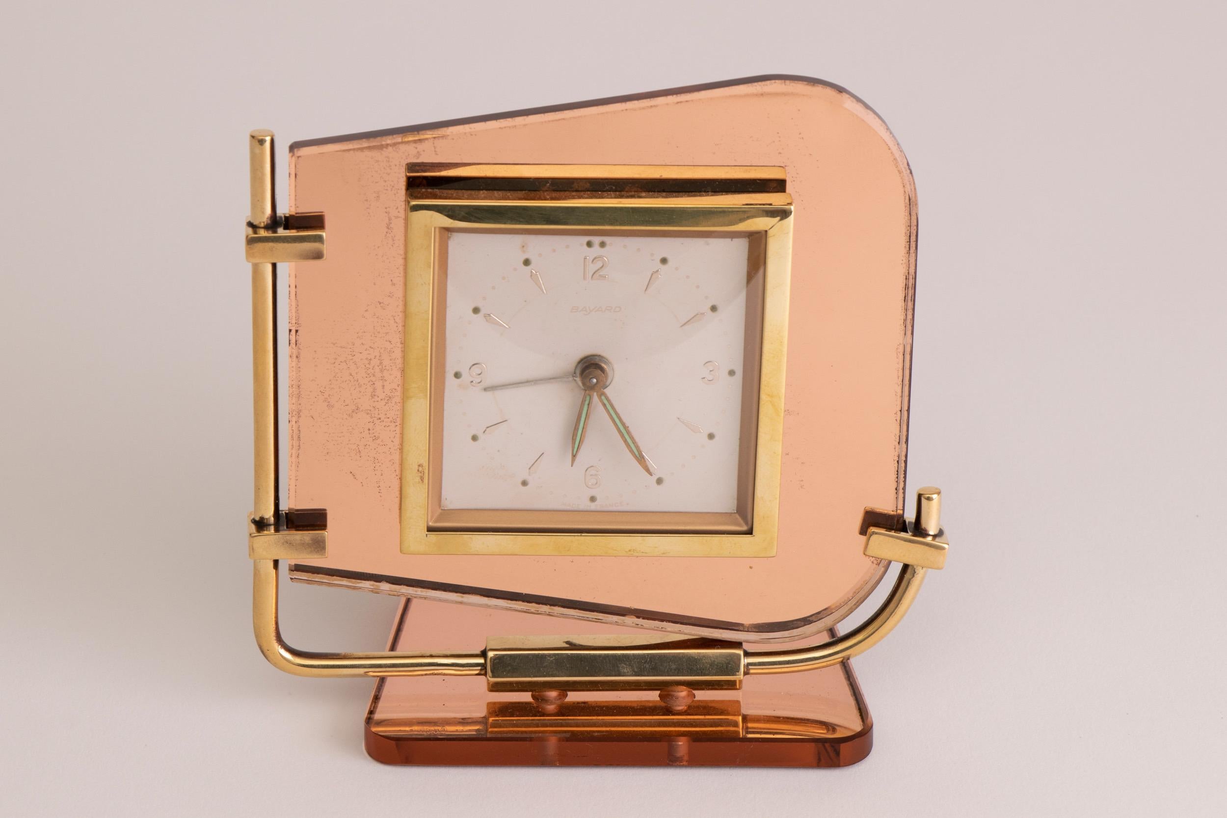 Art Deco clock with peach mirrored glass by Bayard
good working order
Measures: H 13cm, W 14cm, D 7cm
French, circa 1930.
