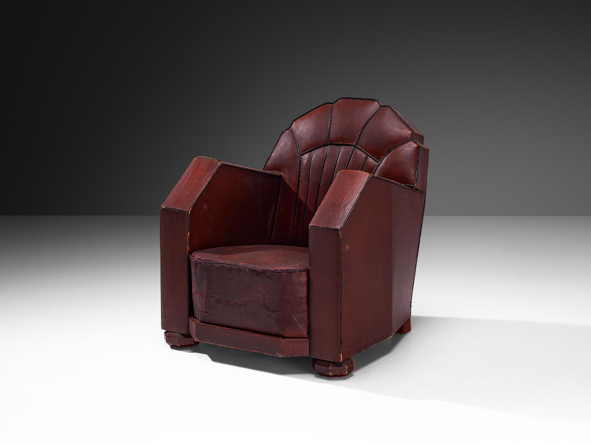Lounge chair, leather, wood, France, 1930s

This armchair of French origin undoubtedly breathes the Art Deco Period of the 1930s. The chair features beautiful streamlined lines and sharp edges. The contours are beautifully highlighted by the black