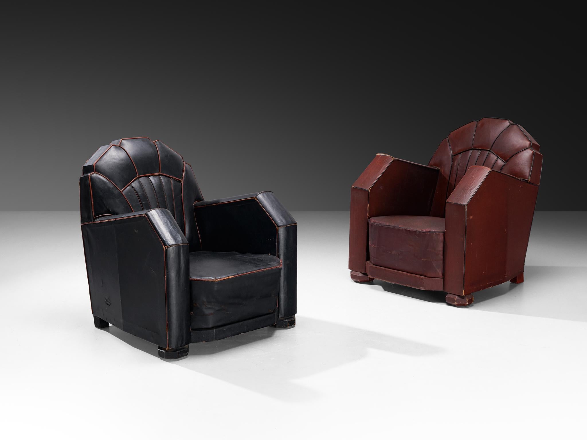 Lounge chairs, leather, wood, France, 1930s

These armchairs of French origin undoubtedly breathes the Art Deco Period of the 1930s. The chairs feature beautiful streamlined lines and sharp edges. The contours are beautifully highlighted by the red
