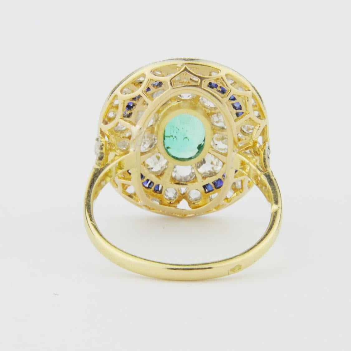 Women's French Art Deco Cocktail Ring with an Emerald, Diamonds and Sapphires