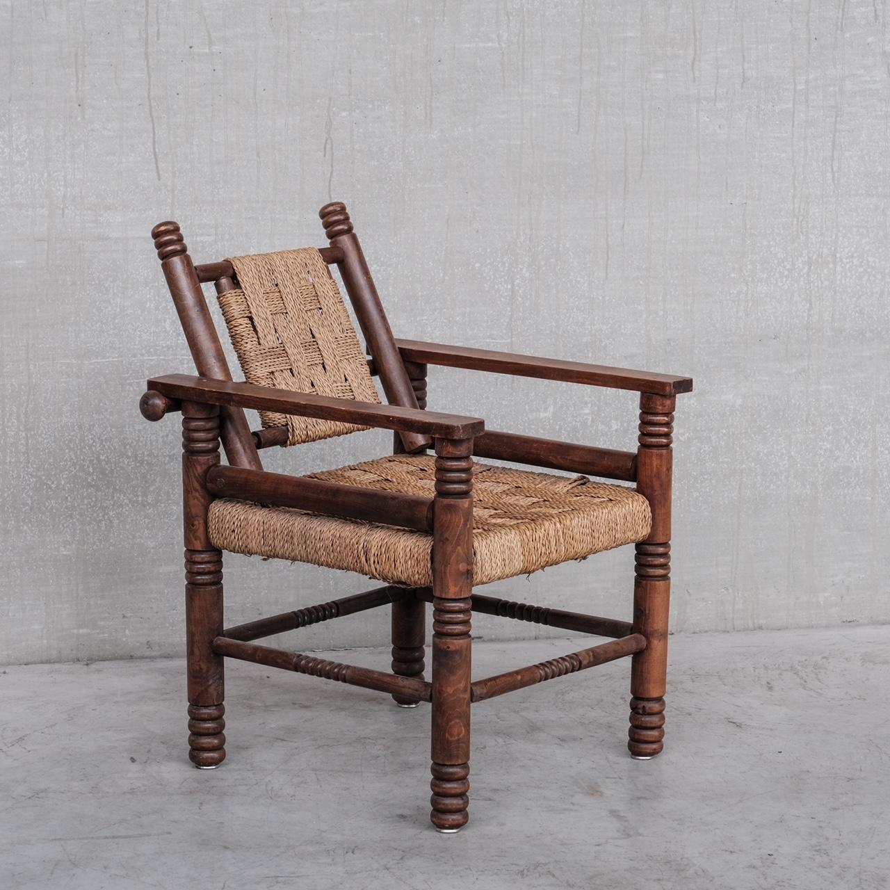 Mid-20th Century French Art Deco Cord and Oak Armchair Attr. to Charles Dudouyt For Sale
