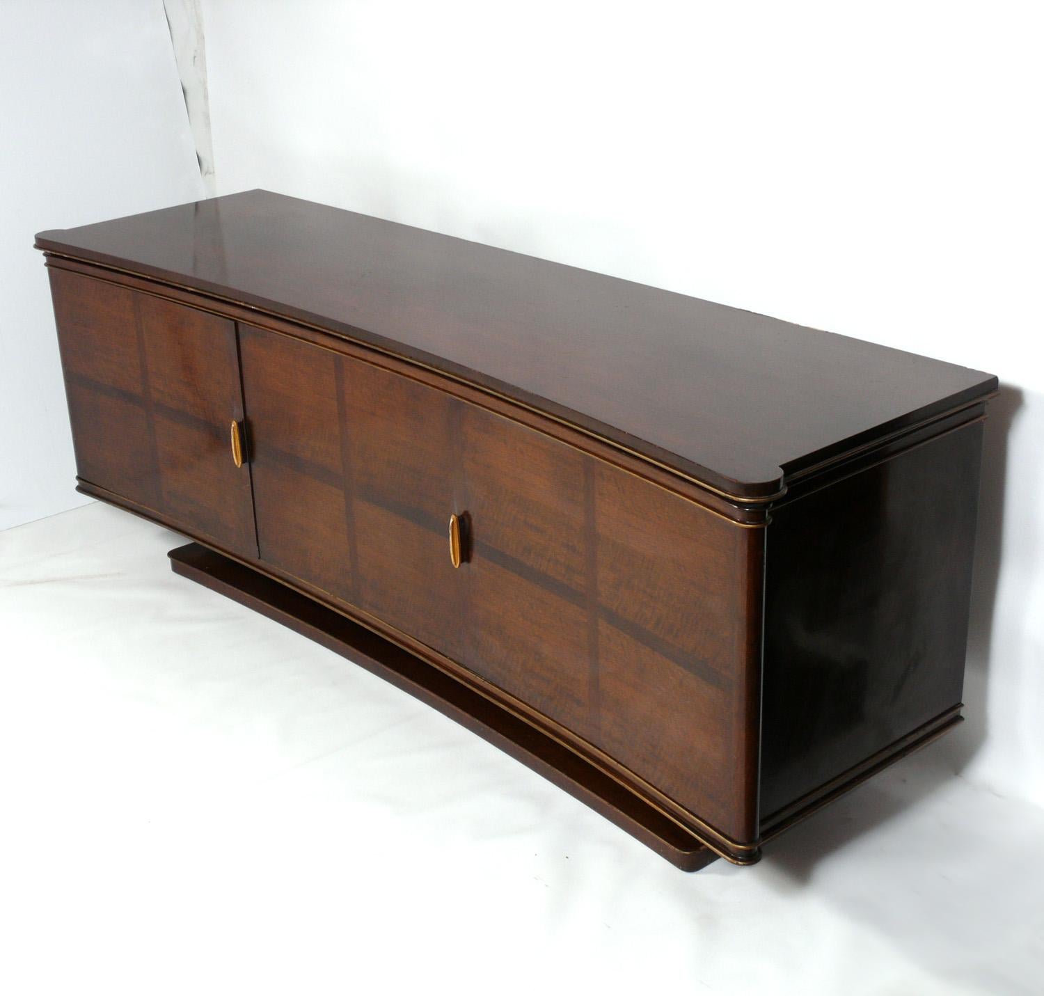 French Art Deco Credenza or Server, France, circa 1940s. This piece is currently being refinished and can be completed in your choice of finish color. It is a versatile size and can be used as a credenza, server, sideboard, media cabinet, or bar in