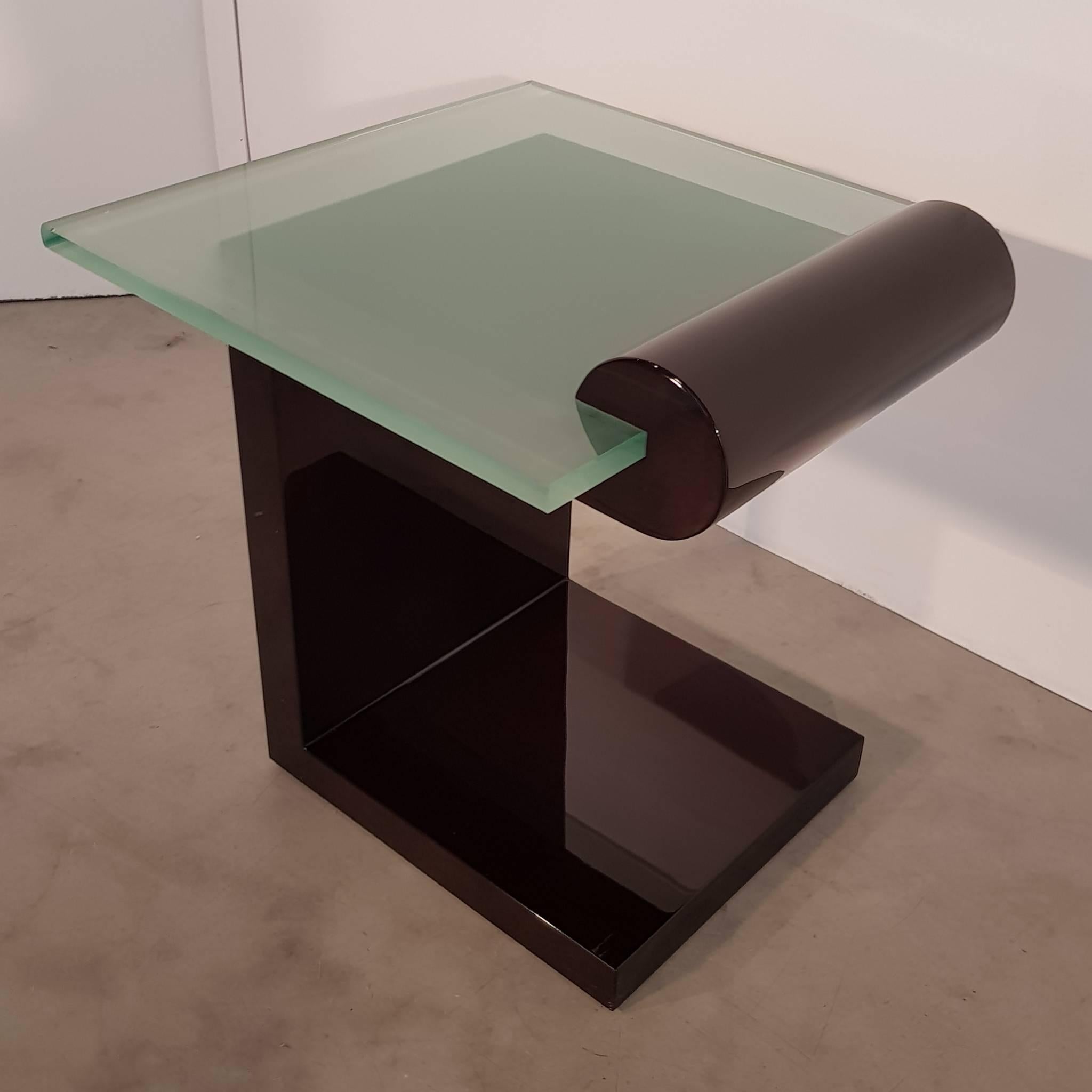Cute geometric side table with dark lacquered walnut veneer and newly changed very thick glass top,
France, 20th century.