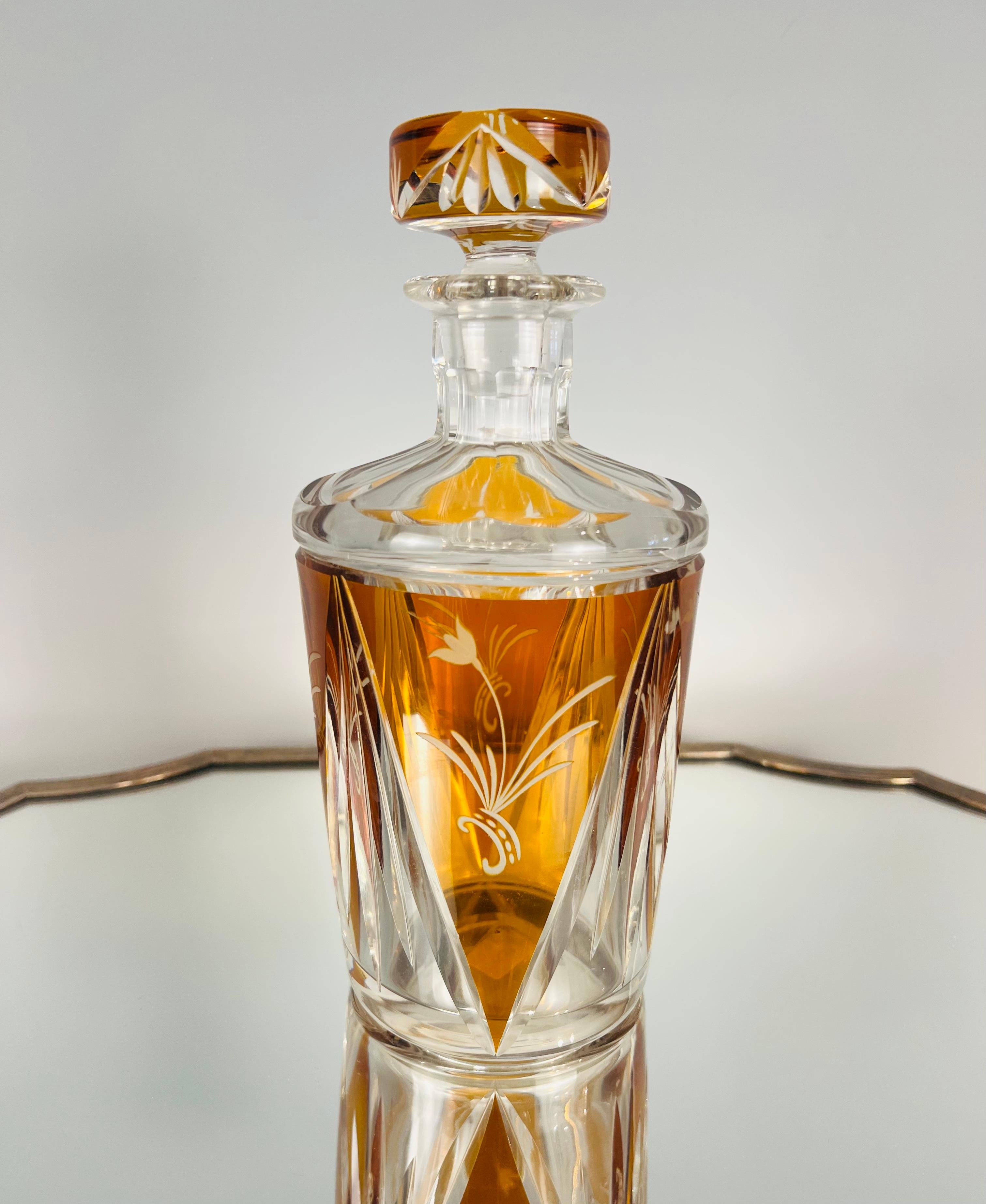 A Gorgeous Art Deco cut glass decanter with floral details in Amber. 
Made in France.
Circa: 1930.