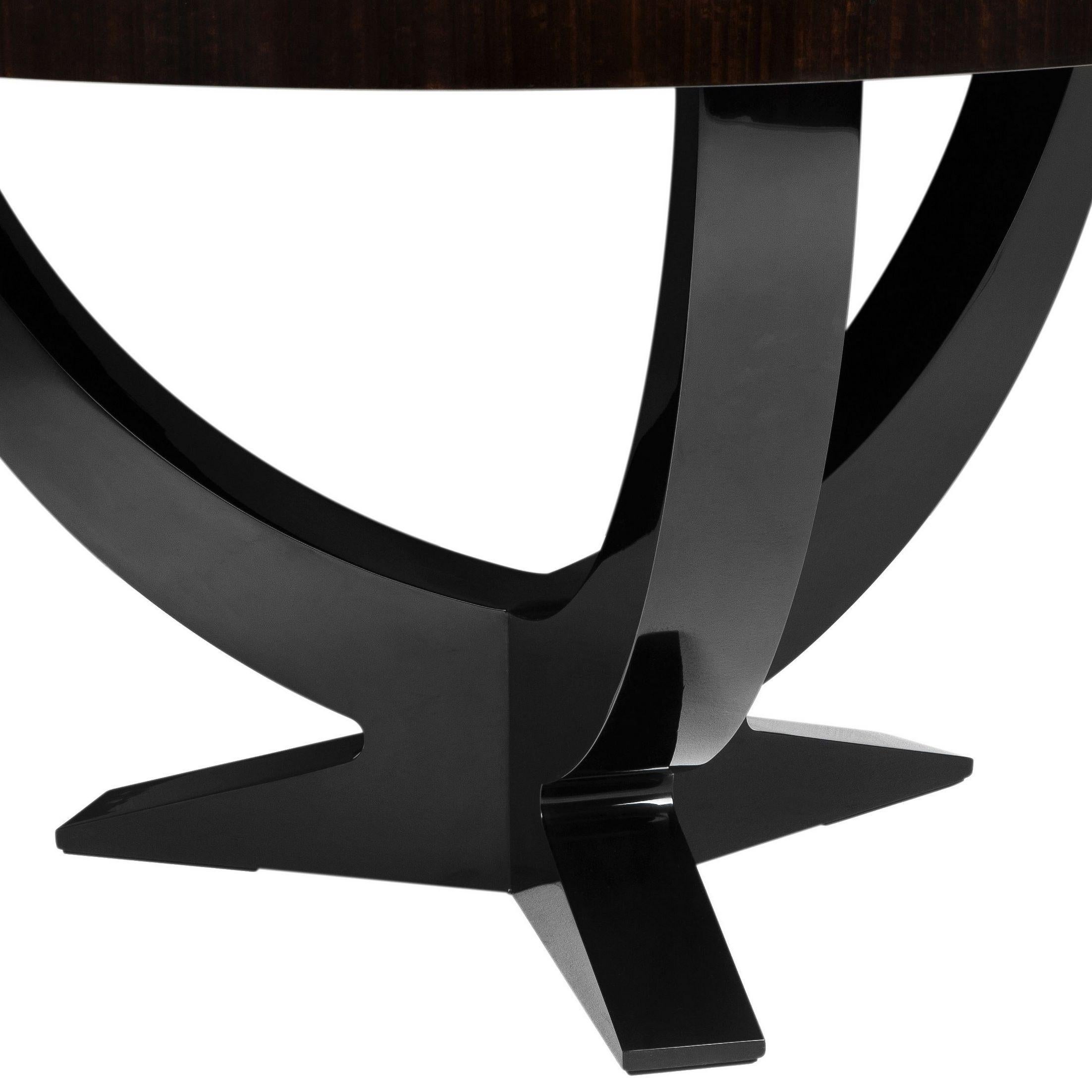 French Art Deco design style black lacquer and mahogany wooden pedestal dining table.