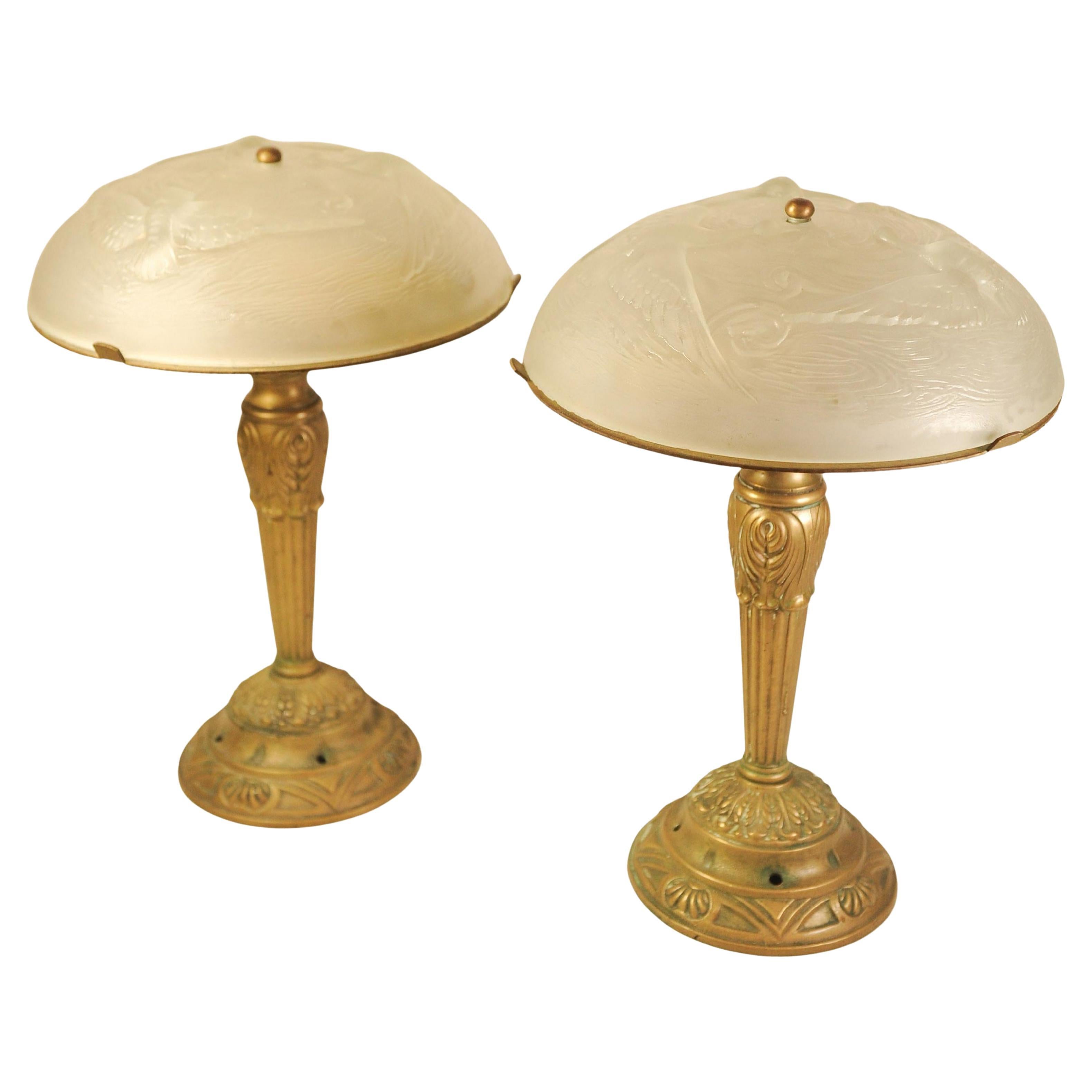 A Pair of French Art Deco Highly Decorative Brass & Glass Table Lamps In The Manner of Léon Hugue and Rene Lalique

Léon Hugue was a producer of art deco lighting in Paris during the Art Deco period. He often used Degué-made shades for his
