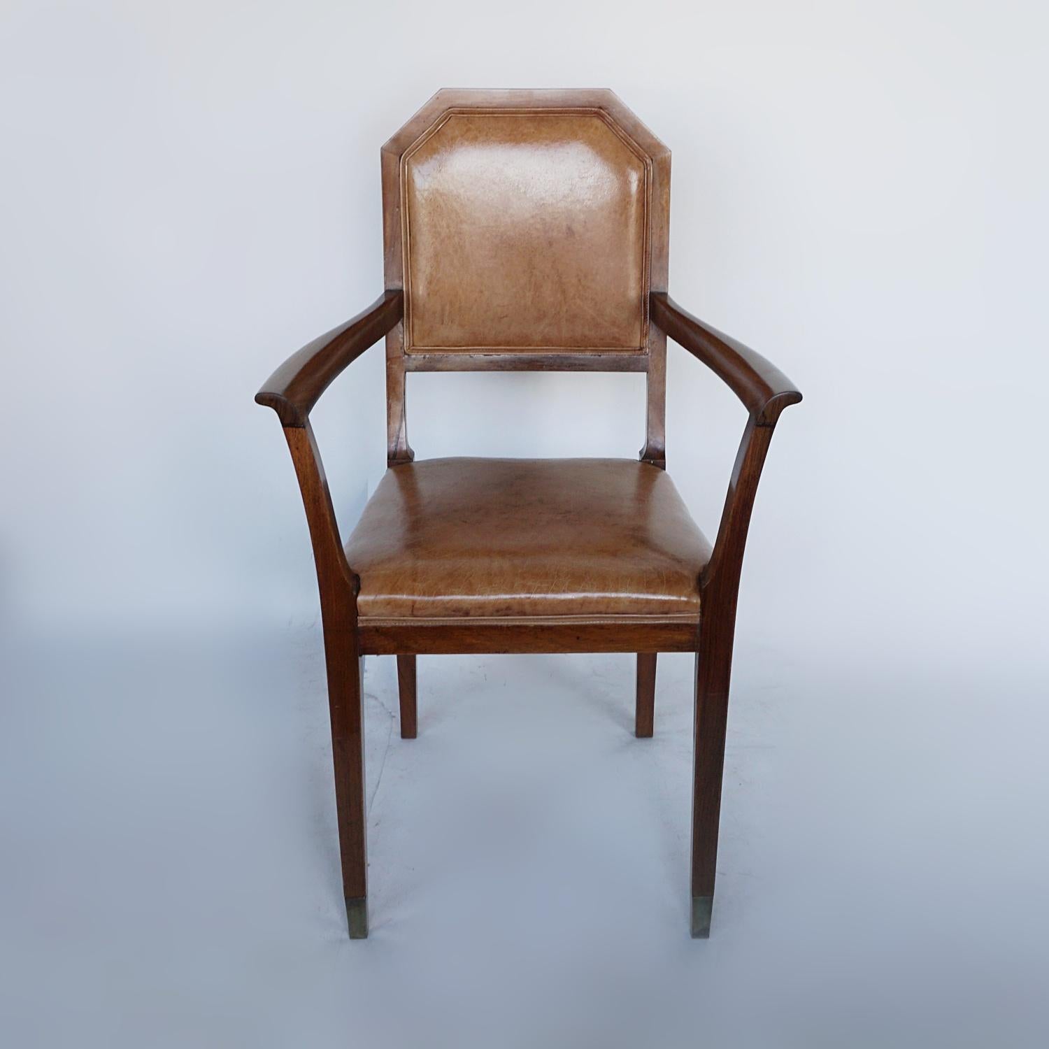 An Art Deco desk chair. Solid walnut, re-upholstered in brown leather. 

Dimensions: H 98cm, W 48cm, D 50cm.

Origin: French

Date: Circa 1925.

Item Number: 2704223.

All of our furniture is extensively polished and restored where