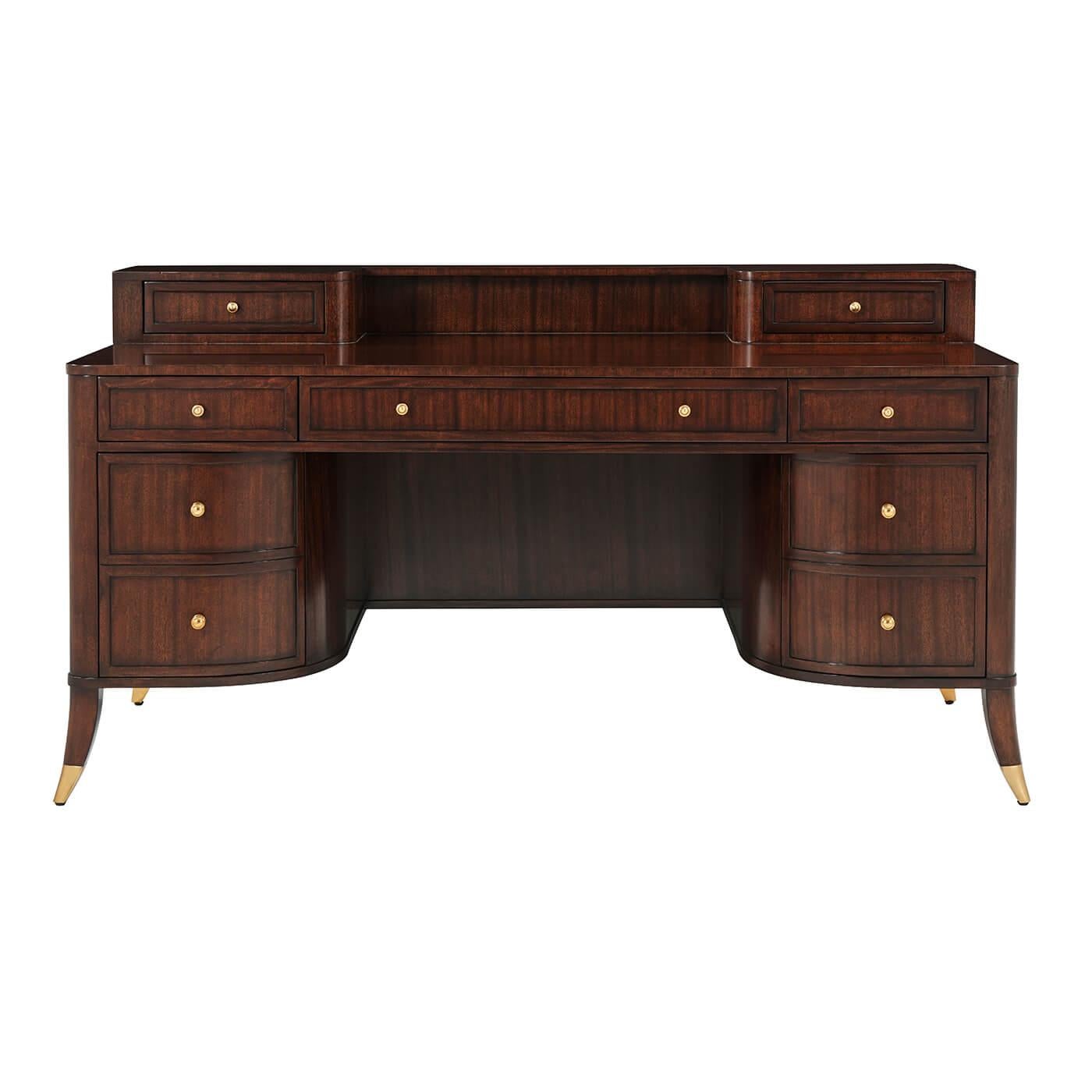 In the Ruhlman Manner, this French Art Deco desk, true to its French lineage, is a study in curves and angles. Two shapely filing drawers flank the kneehole. The mahogany desktop is ready to work with a two-drawer superstructure, and at the frieze,