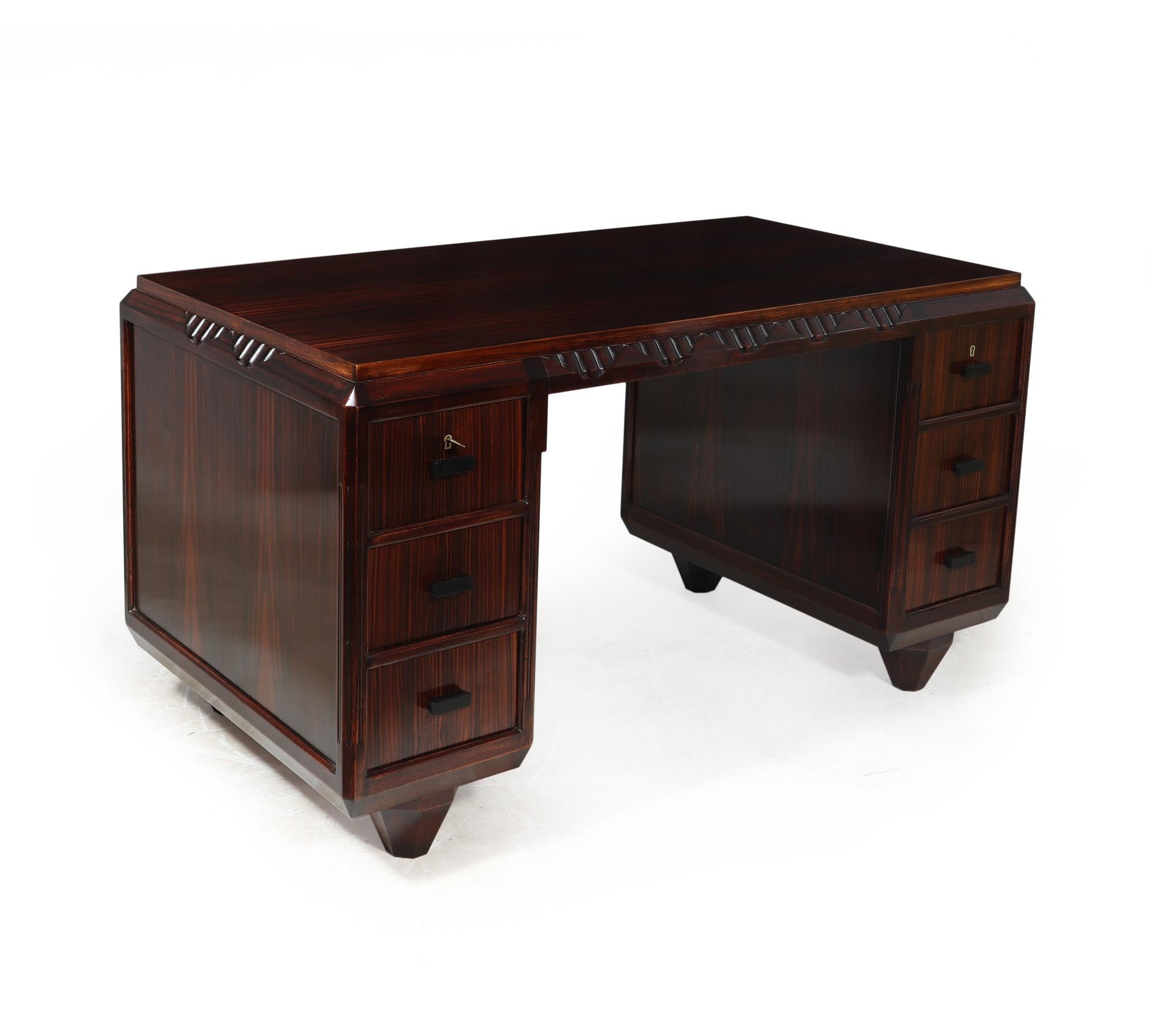 Art Deco Desk - By Louis Majorelle

Exceptional quality Art Deco desk produced in France c1925, in Macassar Ebony and stamped with his unique inlay signature Majorelle Nancy to the inside of the lower left inside the kneehole , three drawers in each