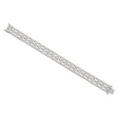 Bracelet ondulé ajouré en platine et diamant Art Déco français