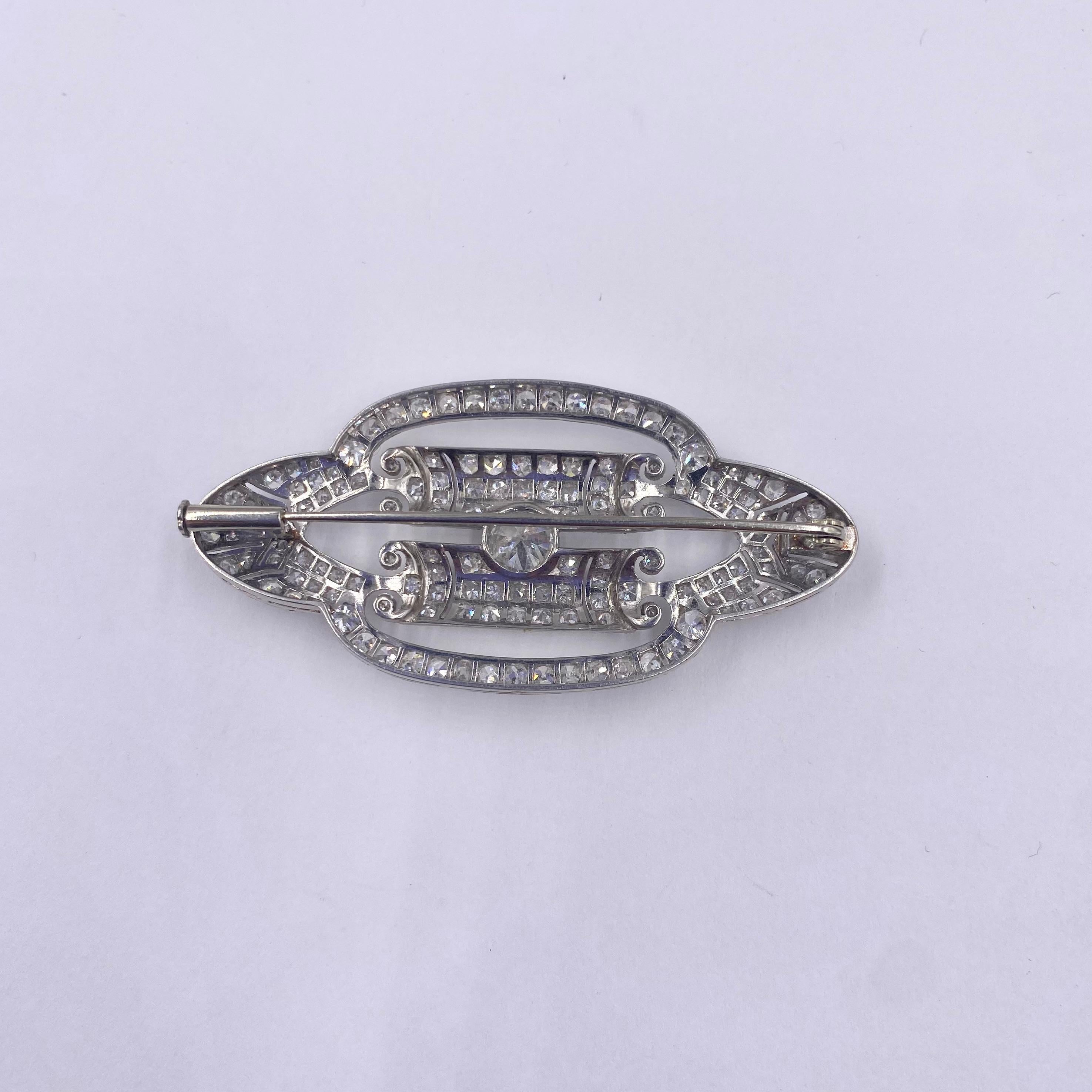18K White gold Brooch. 

Brooch circa 1920 set with an old cut center diamond of approximately 0.90 Carats and approximately 3.00 Carats 8/8 cut diamonds ( H color - Vs clarity). 

Total Weight of diamonds: 3.90 Carats 