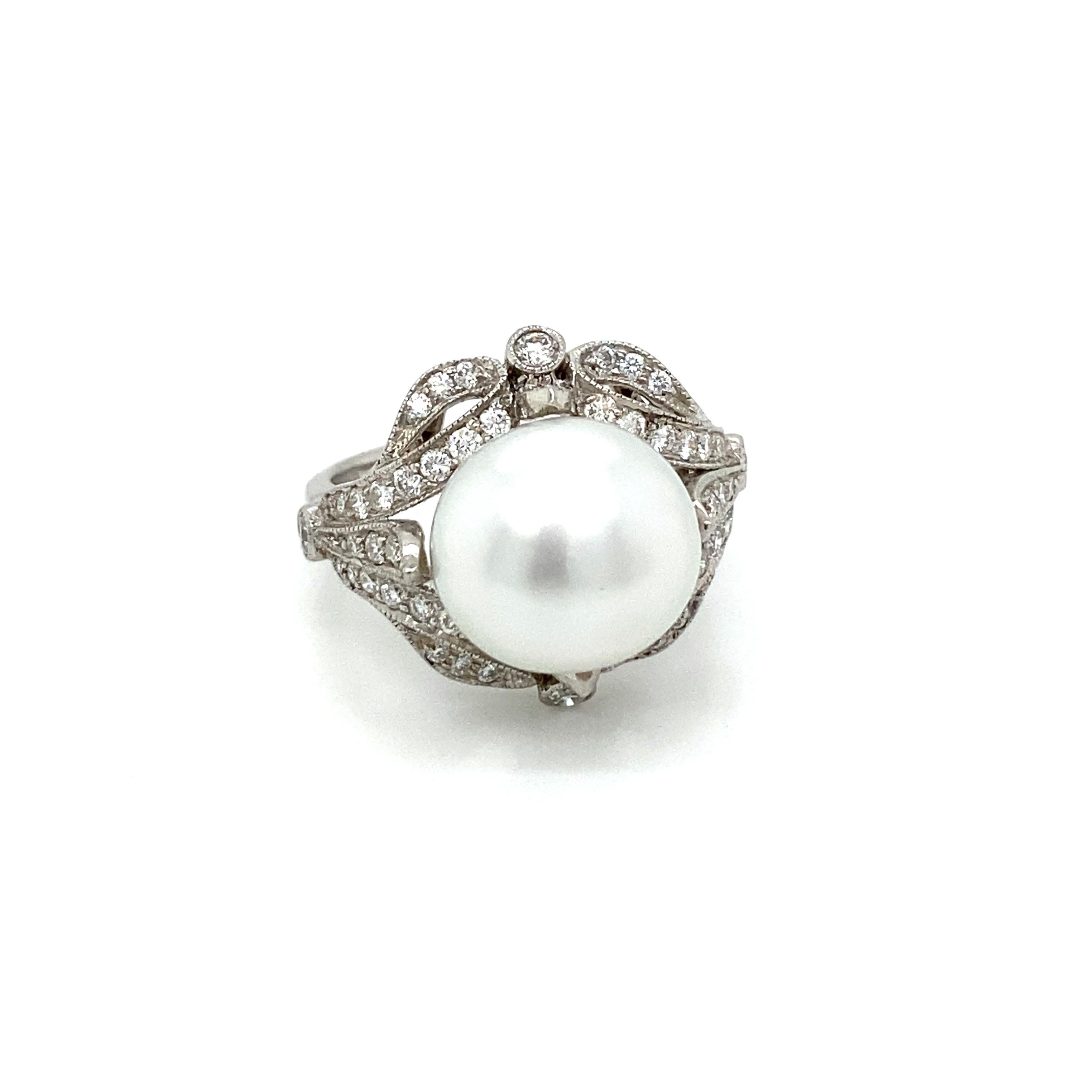 Stunning handcrafted Platinum ring, authentic from 1930', origin France.

It is set in the center with a large and beautiful Keshi pearl and surrounded by approx. 1.10 carat of sparkling round brilliant cut diamonds graded G color Vvs

CONDITION: