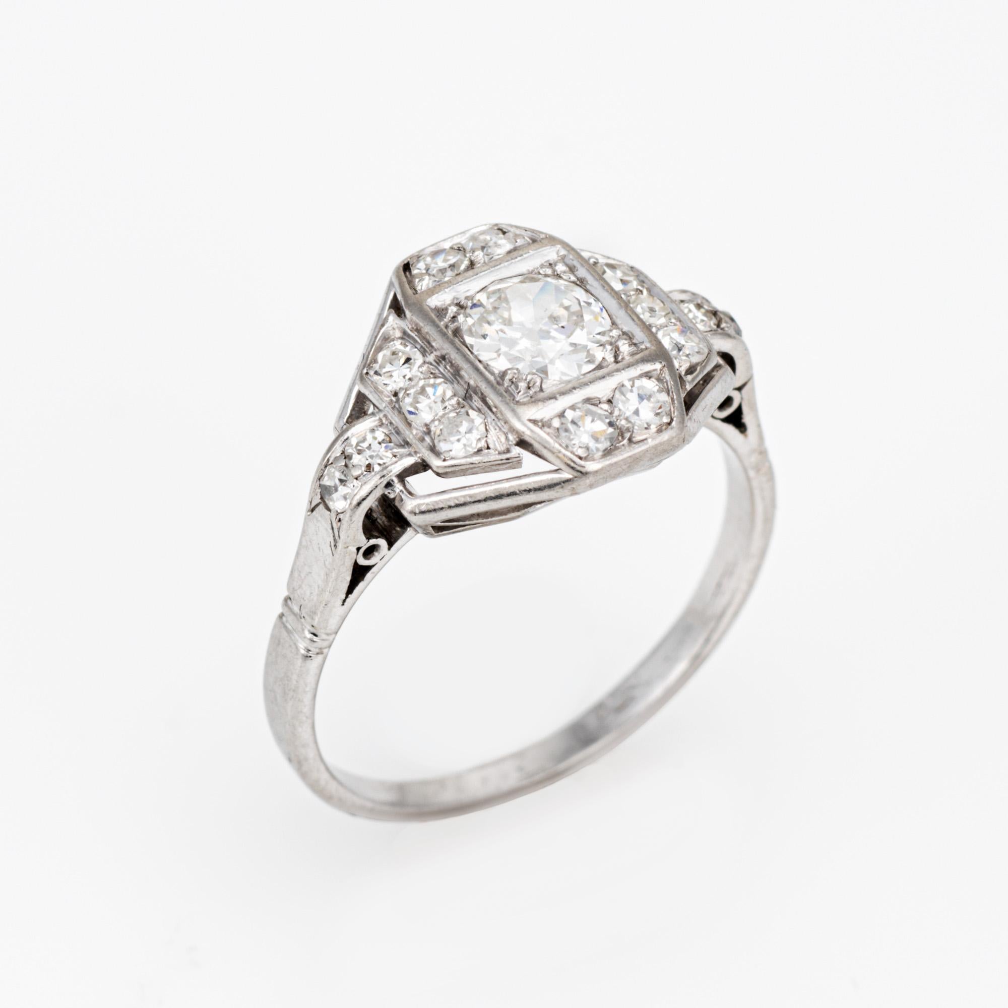 Finely detailed vintage French Art Deco diamond ring (circa 1920s to 1930s) crafted in 900 platinum. 

Center set old European cut diamond is estimated at 0.50 carats, accented with an estimated 0.14 carats of single cut diamonds. The total diamond