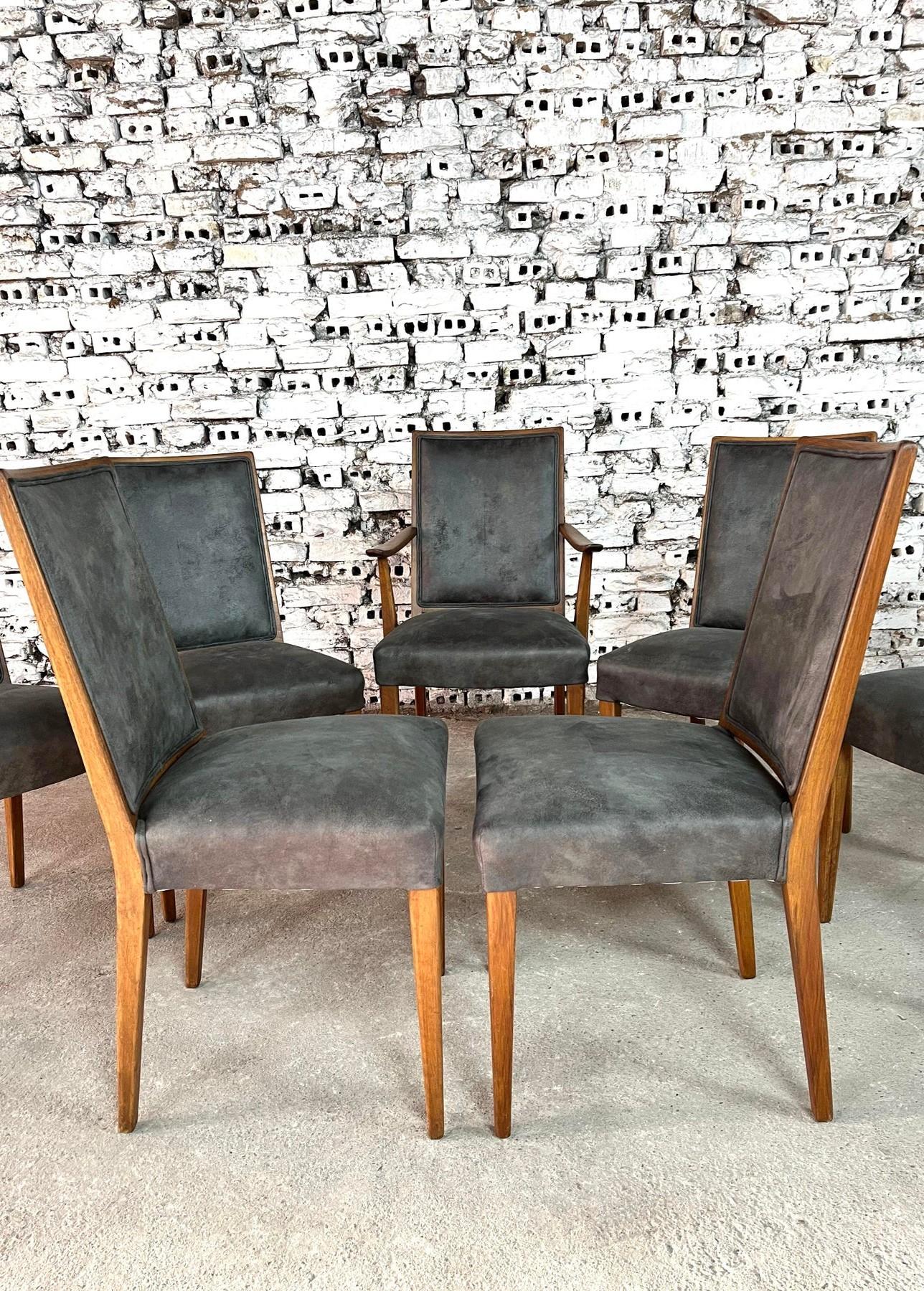 Dimensions: H 36.8” x W 22.2” x D 18.5” x SH 19.6”

Set of 7 French Art Deco Dining Chairs. Newly upholstered in dark grey fabric. One of the chairs is with curved armrests. Solid oak frame. Comfortable and stylish set.


Please see our other