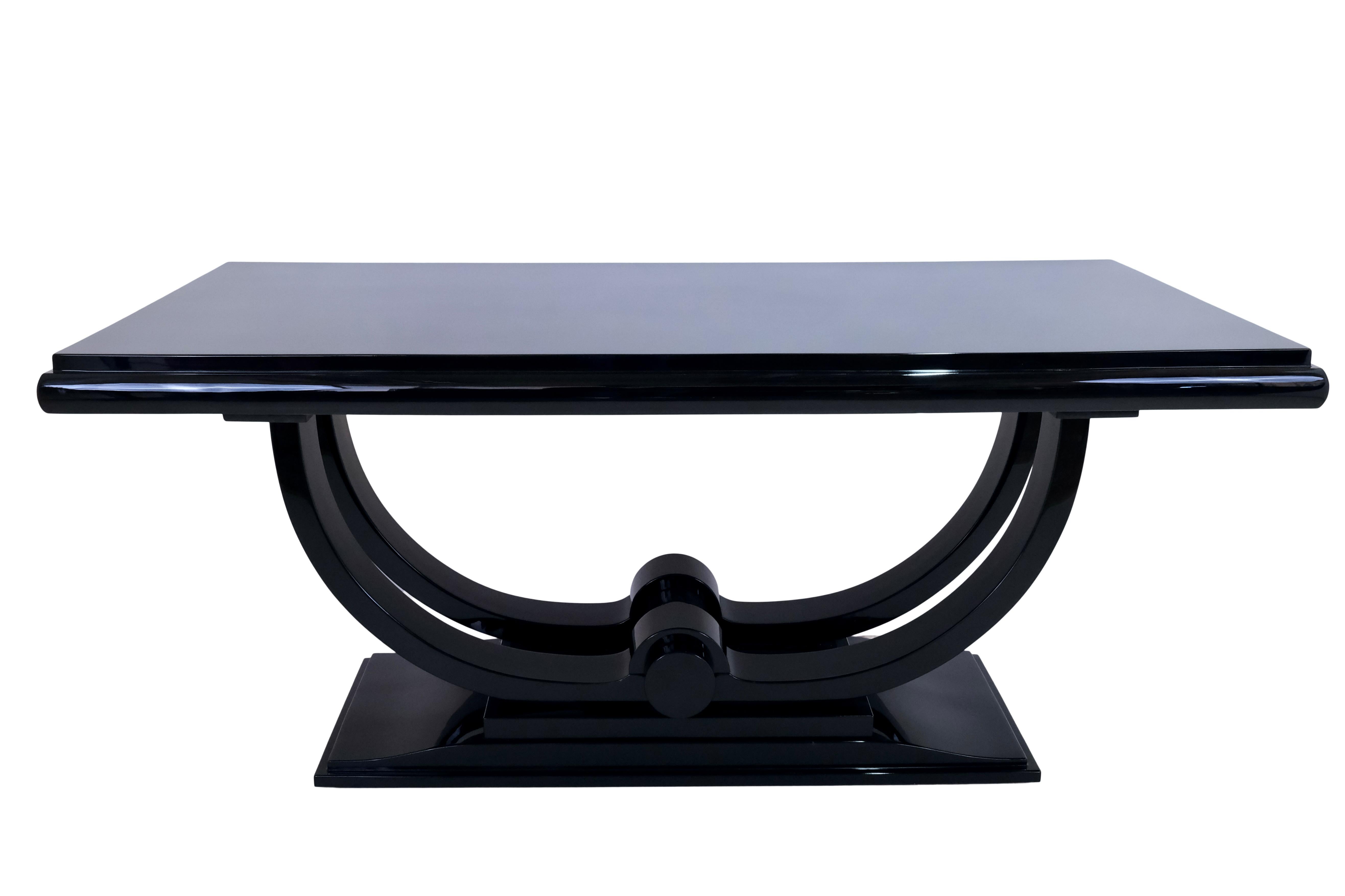 Dining table
Piano lacquer in black high gloss
Extendable on both sides by 2x 40 cm

Original Art Deco, France 1930s

Dimensions:
Width: 180 cm
Height: 78 cm
Depth: 102 cm
Width, extended: 260 cm