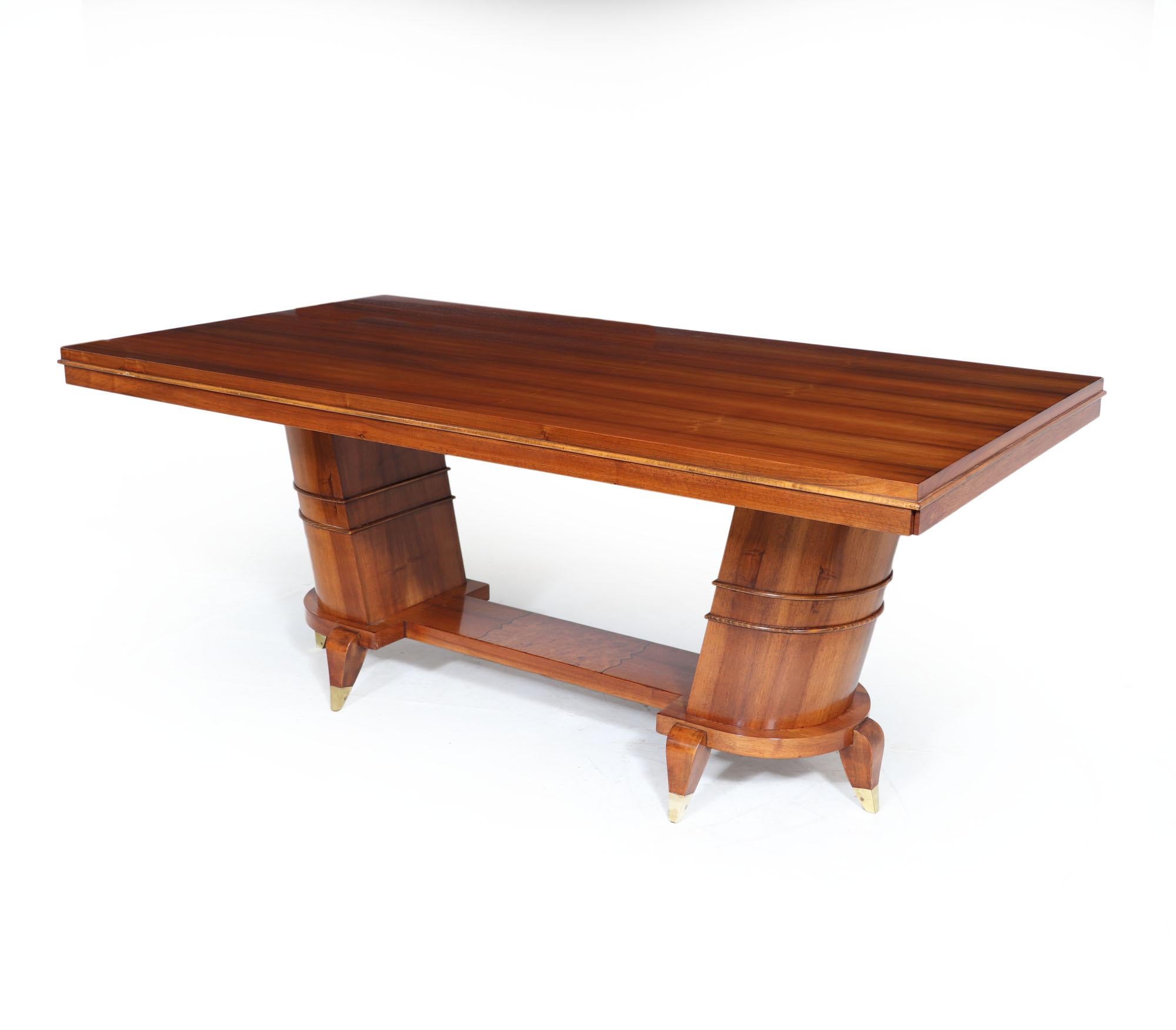 French Art Deco dining table
A very stylish French Art Deco dining table produced in the 1930’s, using straight grain walnut the top extends to fit a further four people so has a max of twelve. The base has two Demi lune angled uprights supporting