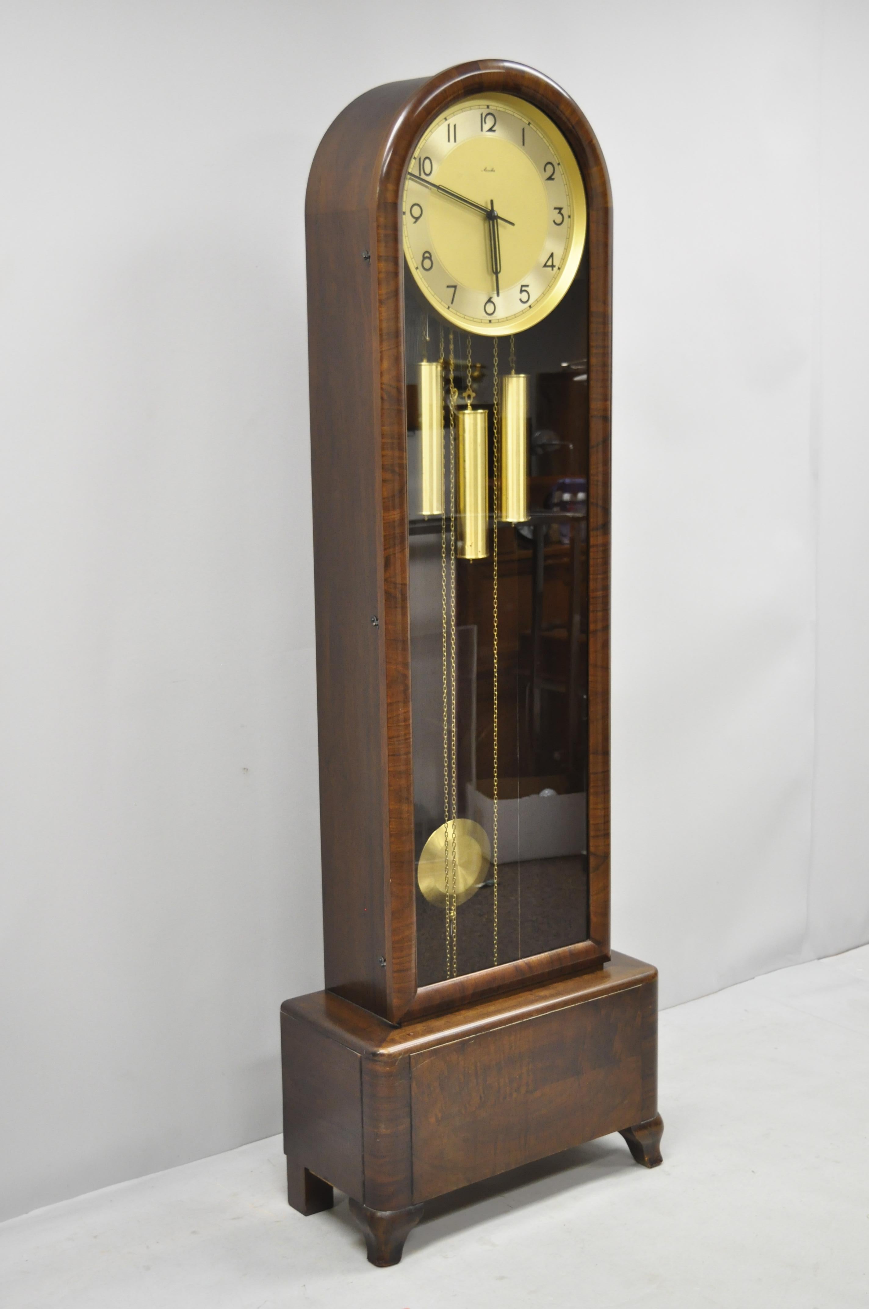 French Art Deco dome top mahogany grandfather clock by Mauthe Westminster Chime. Item features Westminster Chime, beautiful wood grain, original label to rear, quality craftsmanship, we recommend all grandfather clocks are serviced by the buyer.