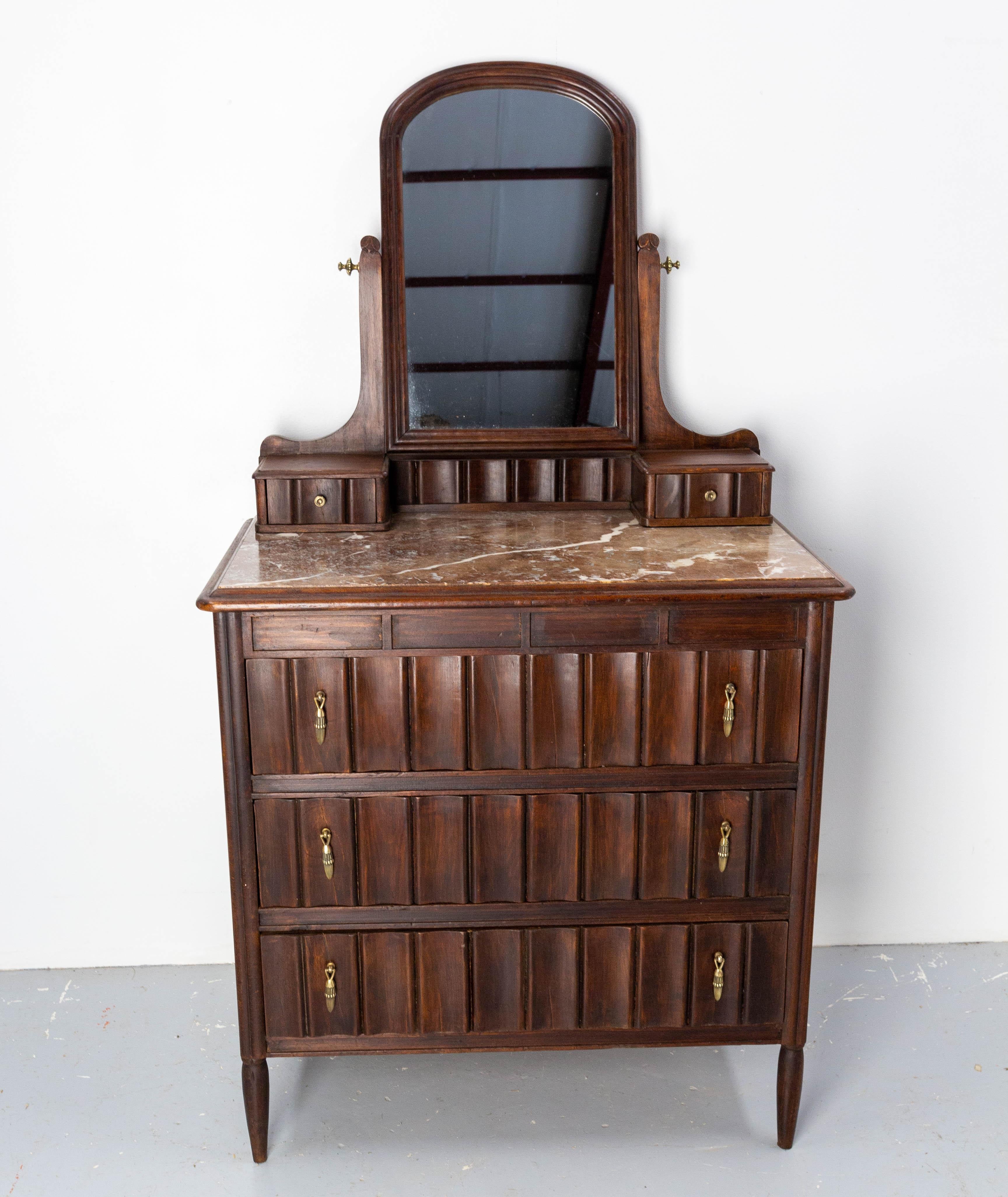 Vanity dressing table with central tilt mirror, two little drawers on the table and three large drawers, made in the Art Déco period
French
Poplar wood tinted, marble and mirror. 
Good antique condition.

