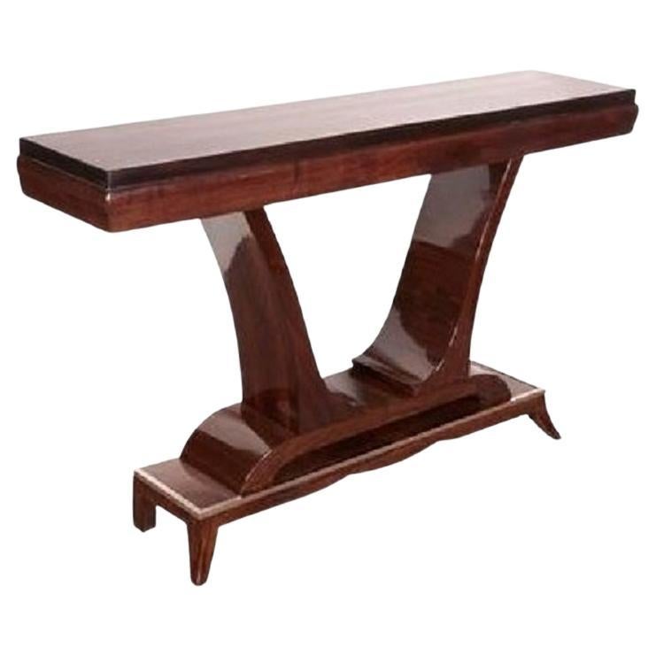 Spectacular French Modern “U” shaped console in walnut, mahogany and palisander with nickeled bronze-mounted stepped pediment base, circa 1925.  
Finished in a high gloss lacquer 
This impressive tulip shape is a graceful design element, typical of