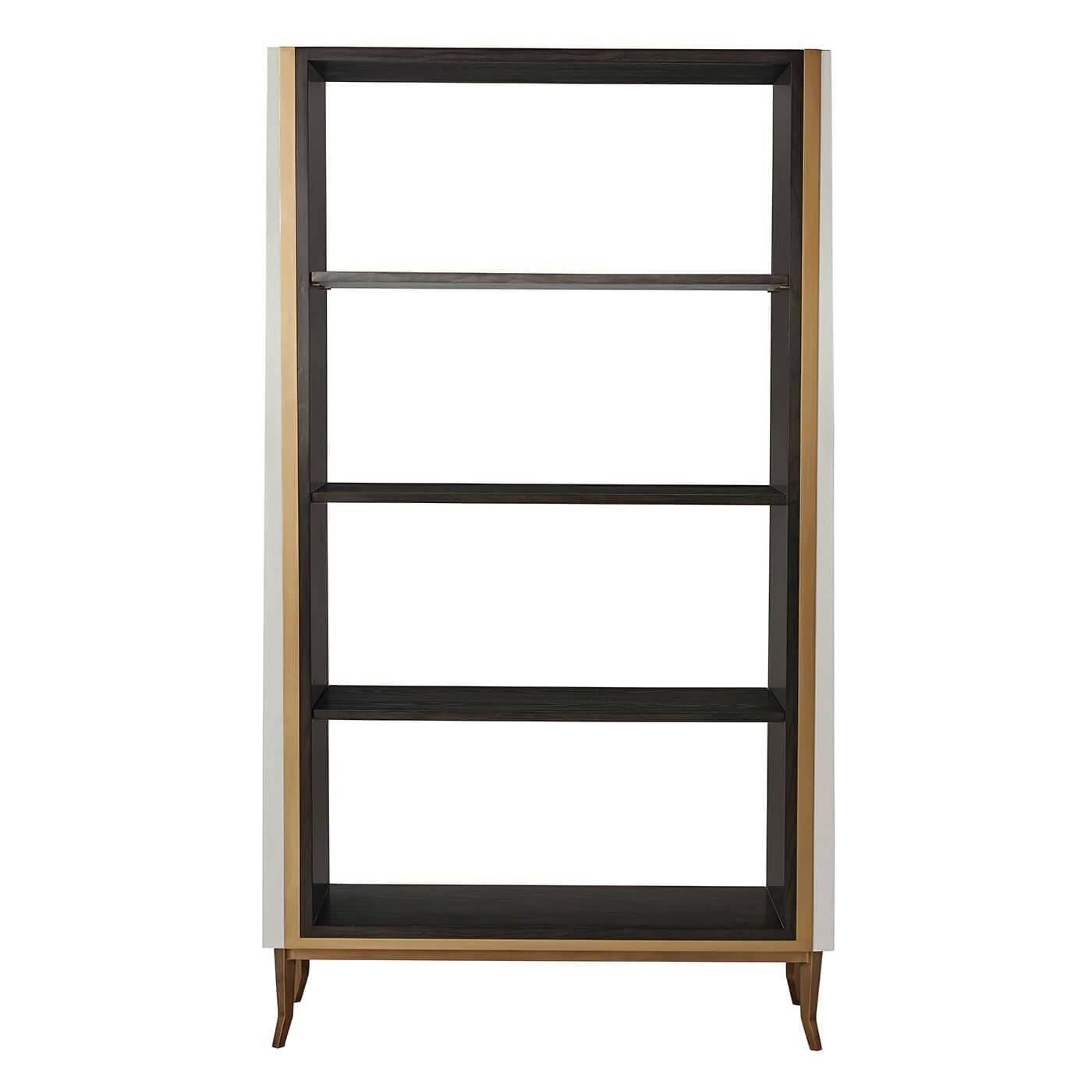 French Art Deco style open bookcase étagère with ash crown veneer, gilt three-quarter frame, with three shelves, (two adjustable) and tern finish shagreen embossed leather exterior panels.

Dimensions: 42