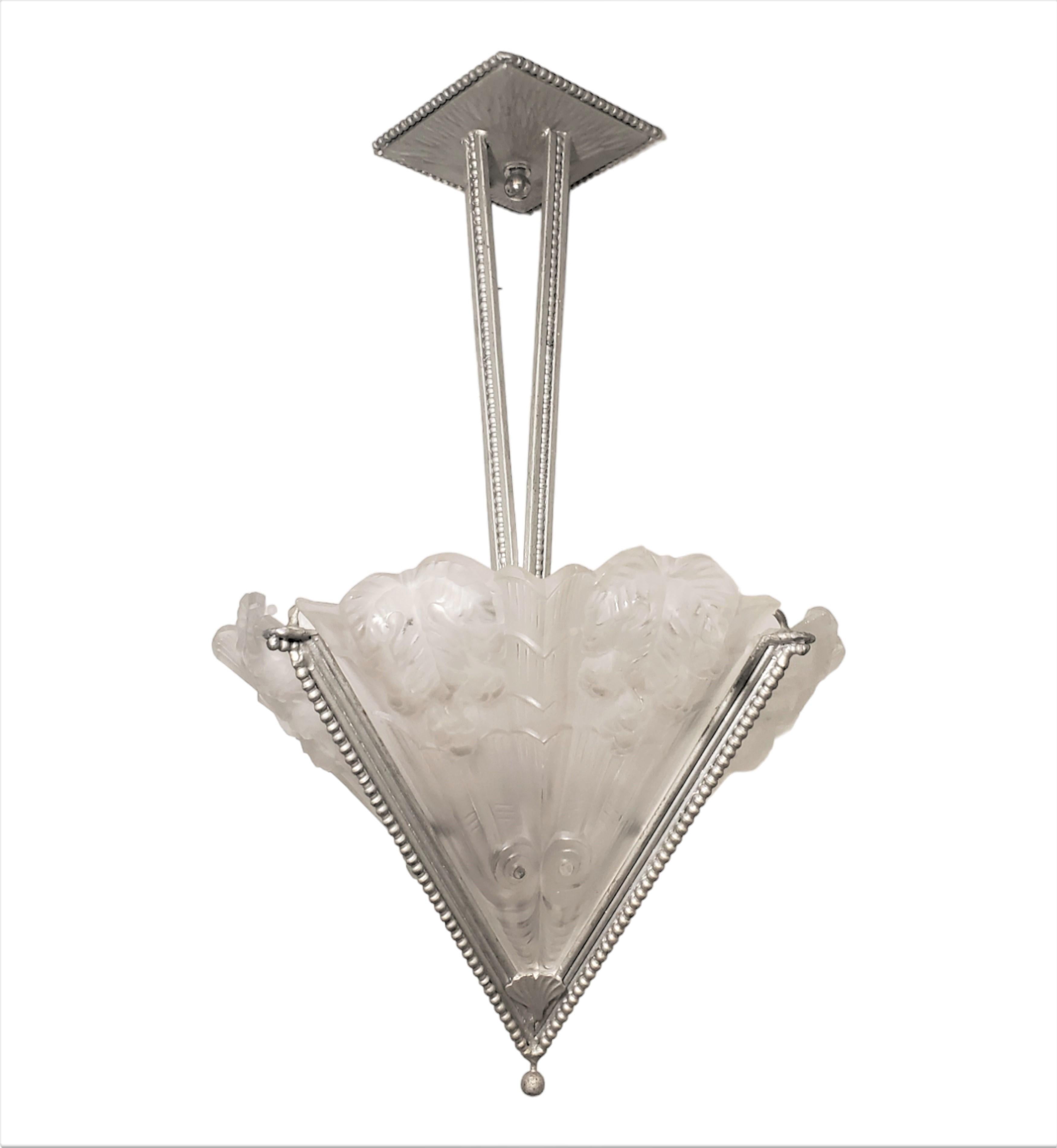 Lovely and delicate French Art Deco frosted art glass blossom chandelier signed Noverdy, France depose. Its distinctive design comprises four 