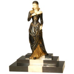 French Art Deco Figure of a Lady Descending a Marble Staircase by E. Mennevile