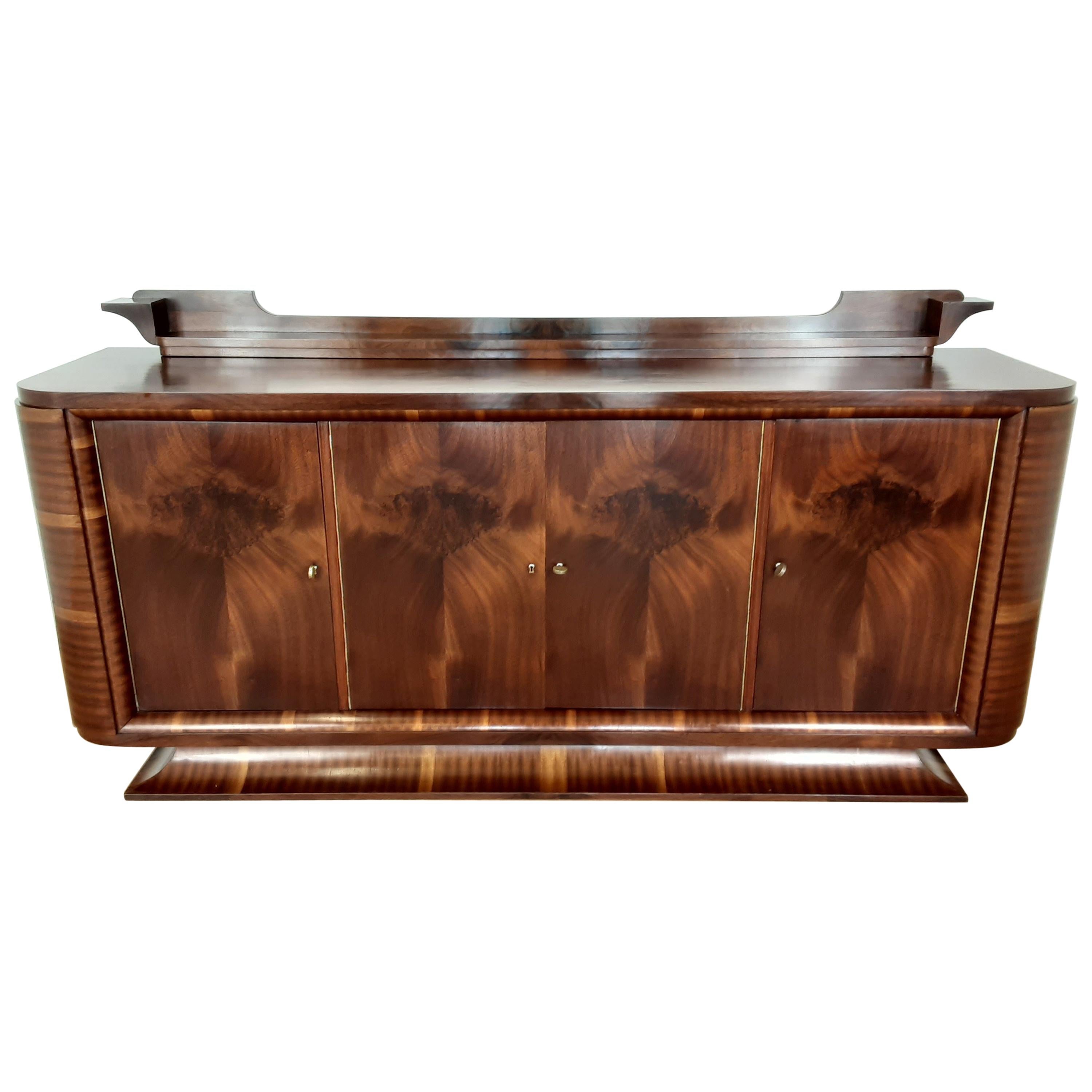 French Art Deco Flame Mahogany Sideboard with Winged Back Shelf and Curved Base For Sale