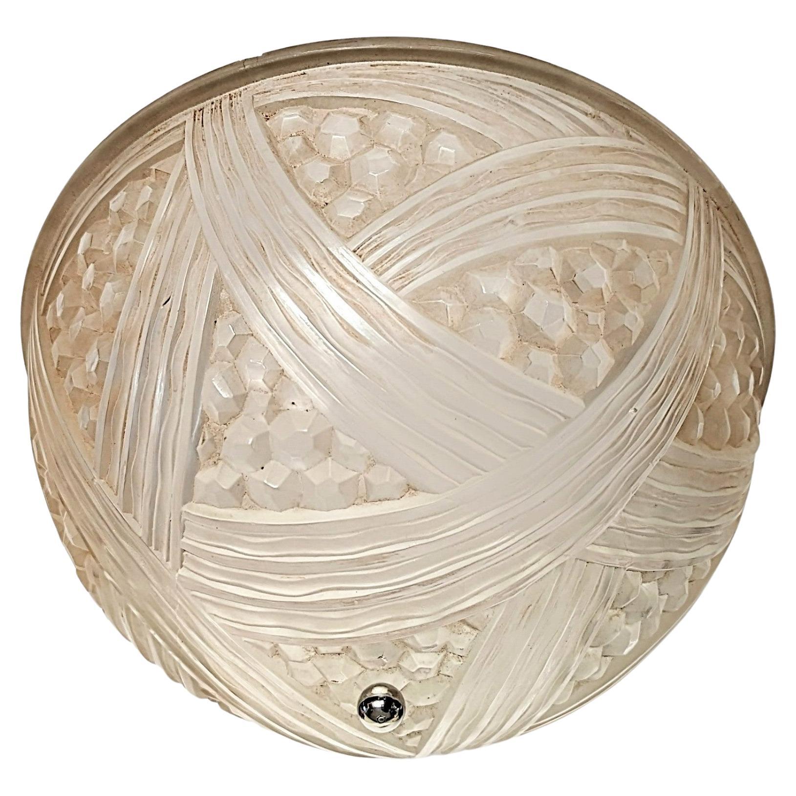 A French Art Deco flush mount was created and signed by the French artist 