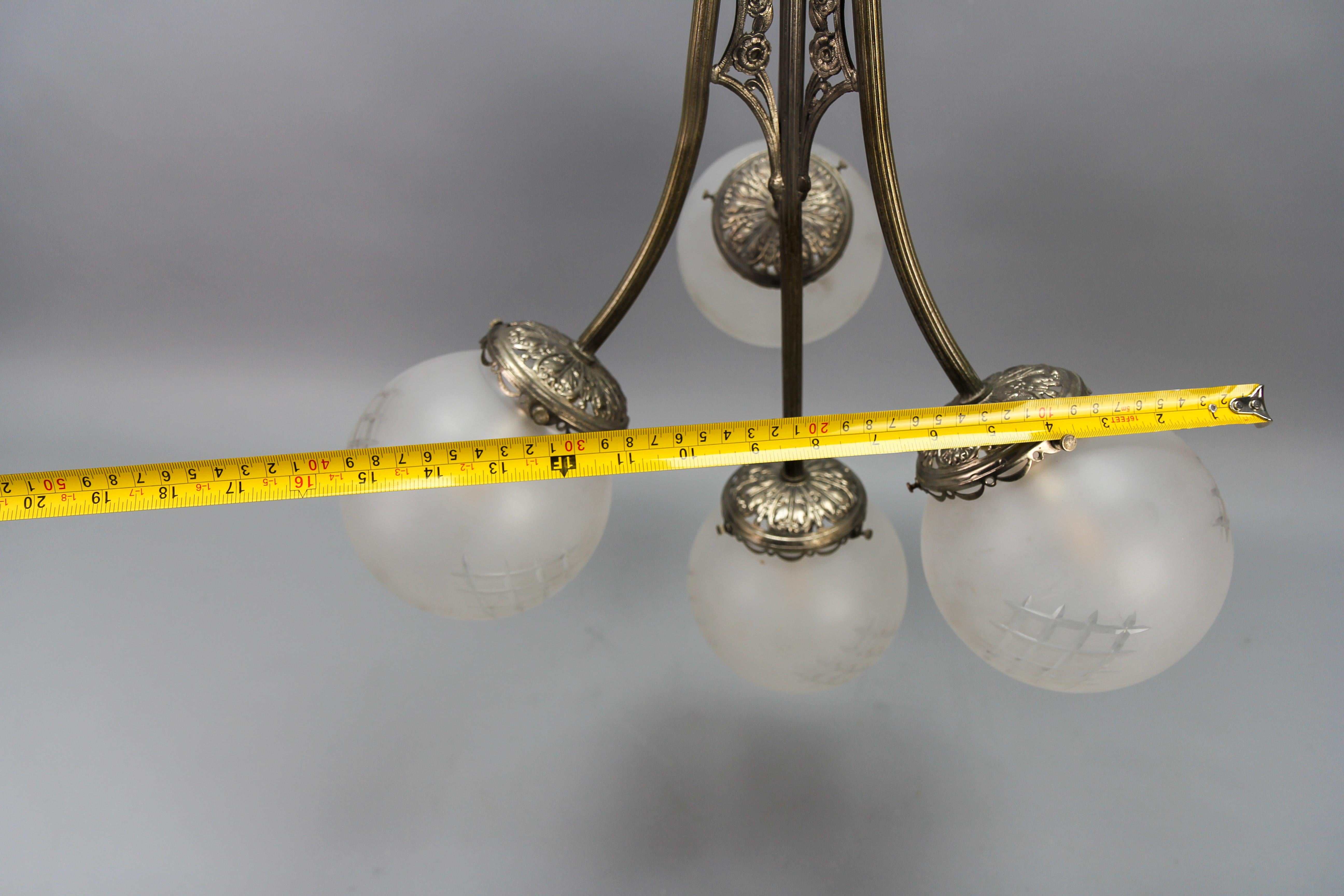 French Art Deco Four-Light Brass and Frosted Cut Glass Globes Pendant Chandelier For Sale 11