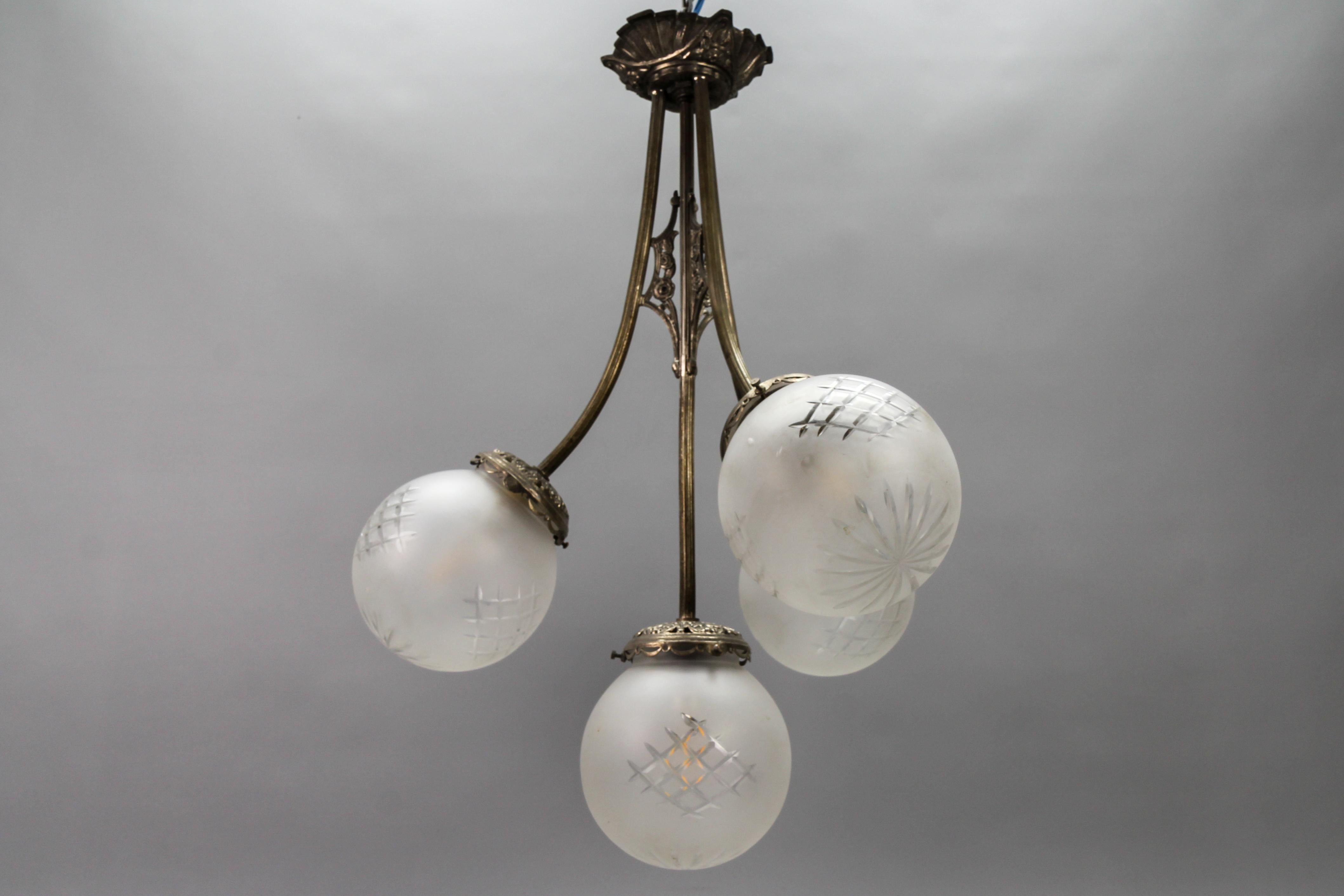 French Art Deco Four-Light Brass and Frosted Cut Glass Globes Pendant Chandelier For Sale 5