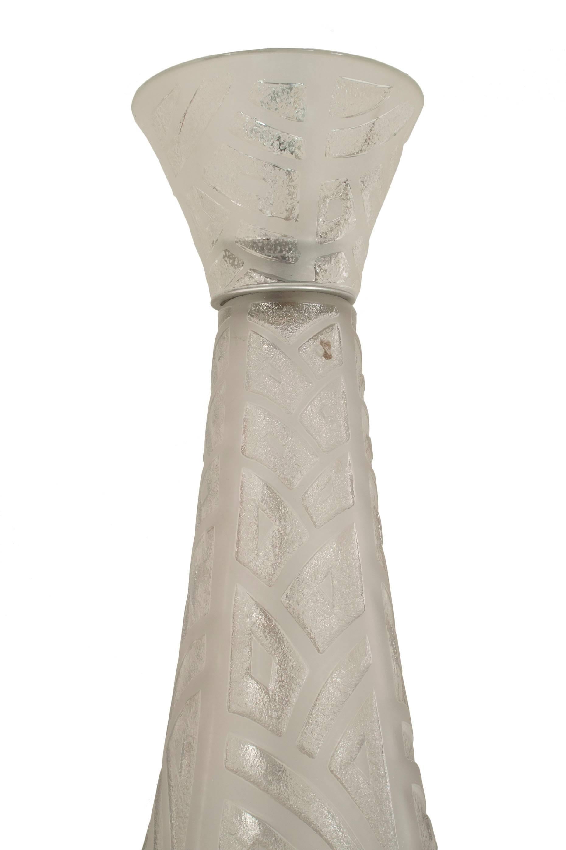 French Art Deco frosted acid-etched glass lantern with a geometric design having a half round dome base under a conical shaped center-post with a finial bottom (DAUM).
