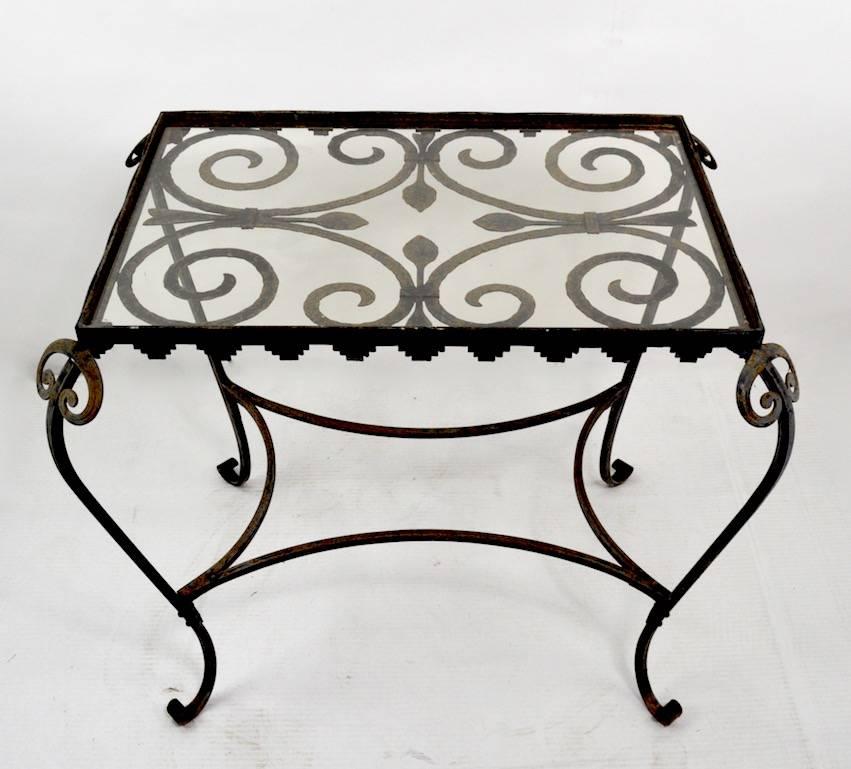 Wonderful quality metal work, sophisticated Art Deco style, probably French in origin. This example is selling in as found condition, showing only light cosmetic wear to finish, normal and consistent with age. Glass top (original) has very minor