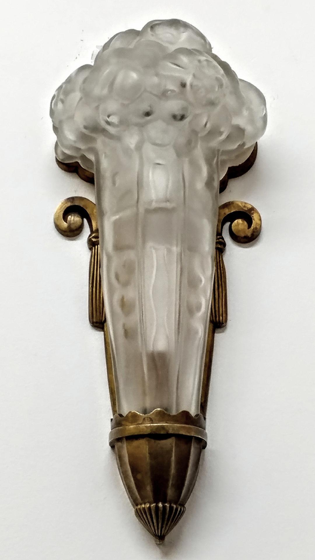A French Art Deco wall sconce by the French artists 