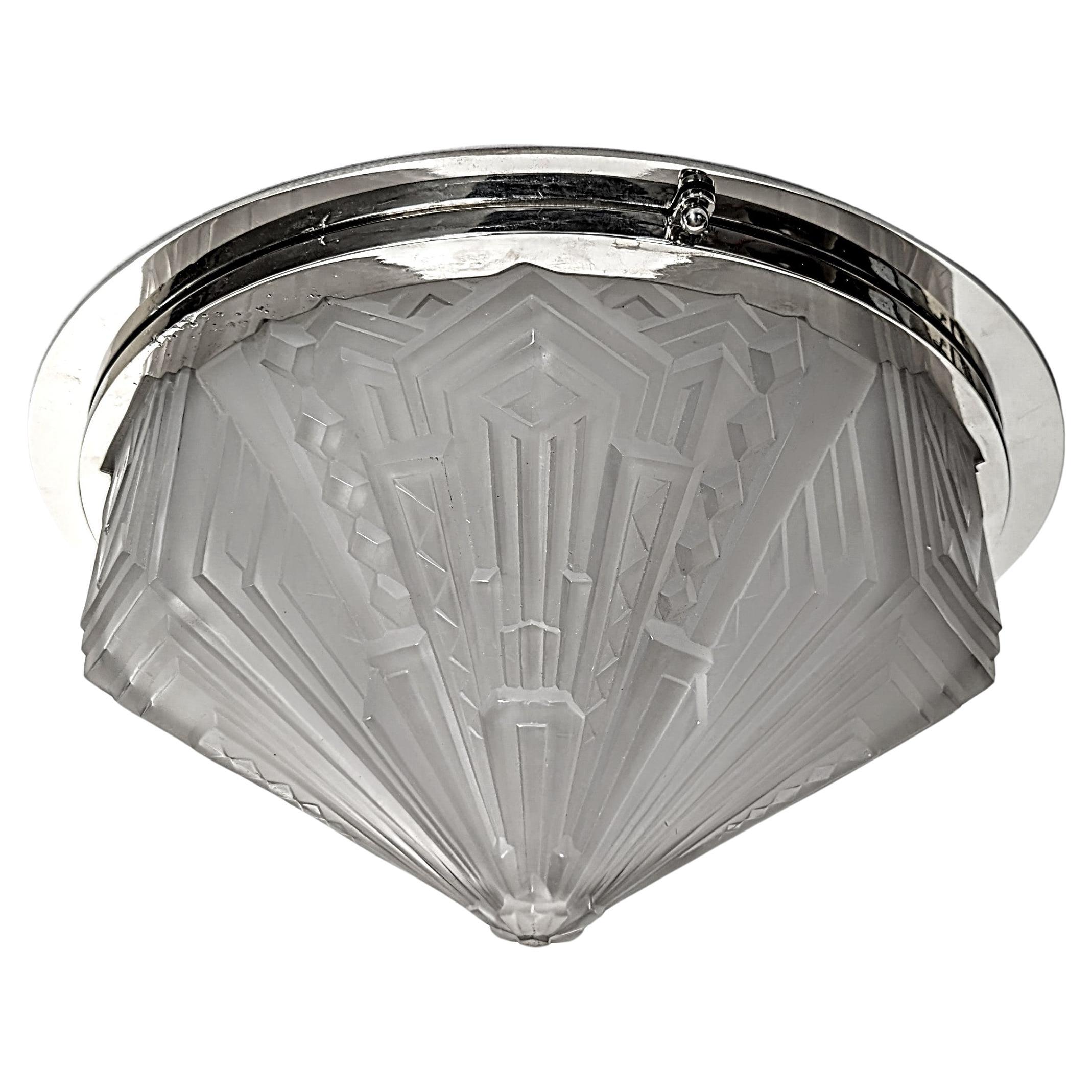 A very unusual hard to come by French Art Deco flush mount was created by 