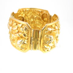 French Art Deco Gilded Floral Repousse Hinged Bracelet, 1920s