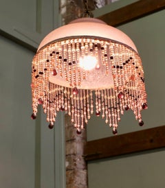 French Art Deco Glass Pendant Light with Beaded Shade A very pretty piece