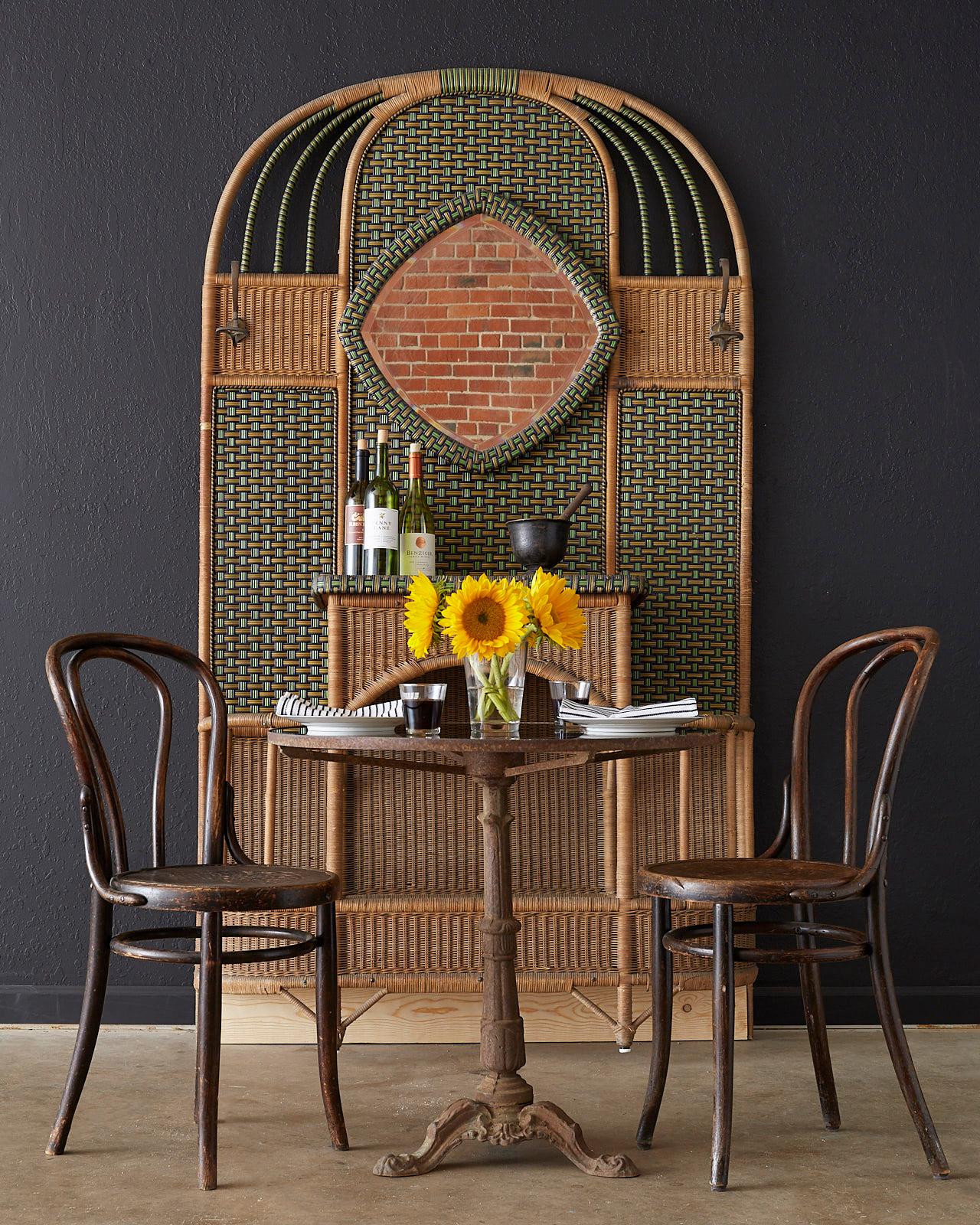 Early 20th century French Art Deco period bistro or cafe dining table. Features a round glass in set top with a heavily patinated cast iron frame. Rate and unusual style with a lovely distressed finish that gives it character and charm. From an