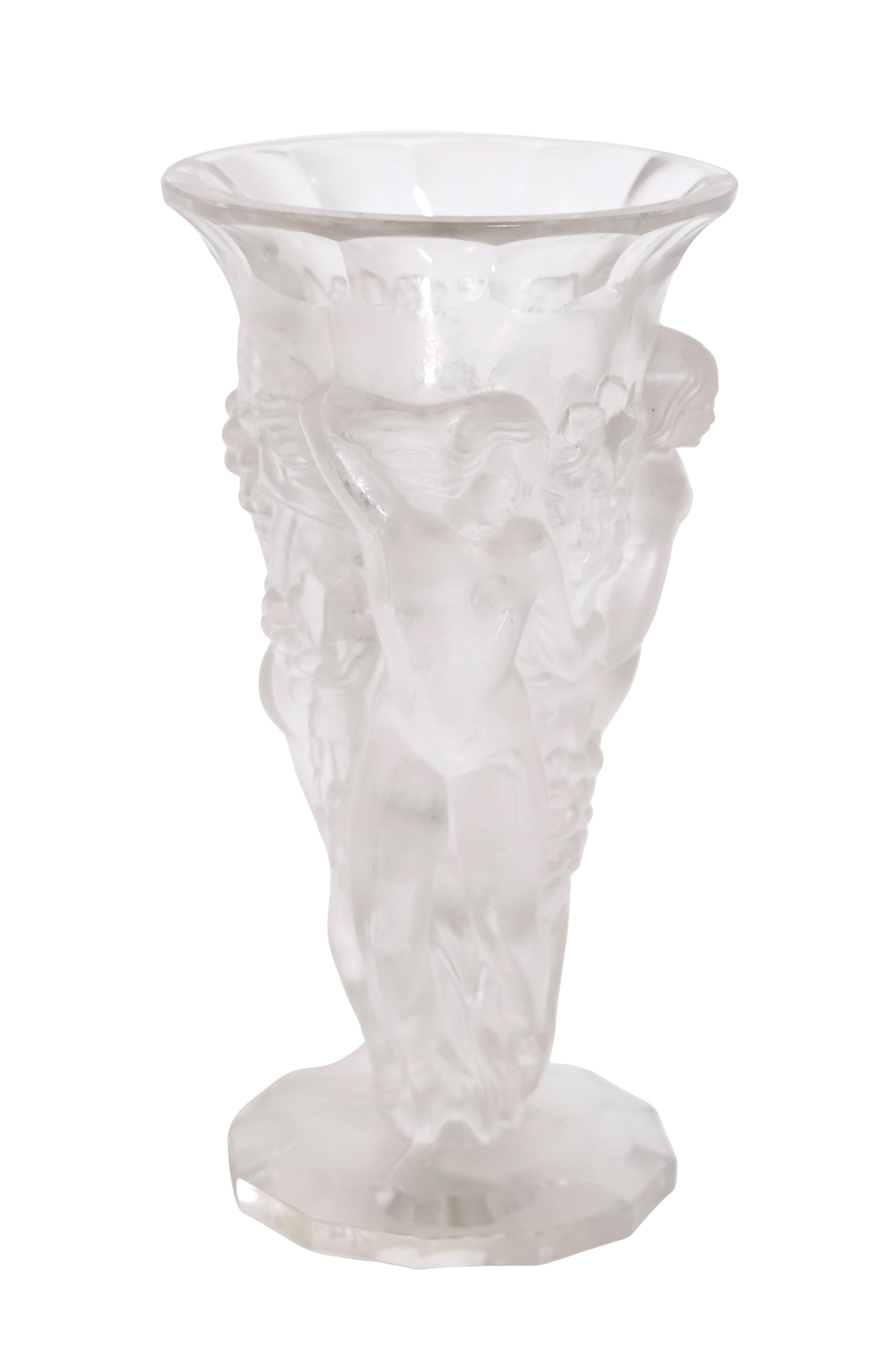 Glass vase from Verlys
Dancers decorate the vase all around

Original Art Deco, France 1920s

Dimensions:
Diameter: 12 cm
Height: 22 cm.
