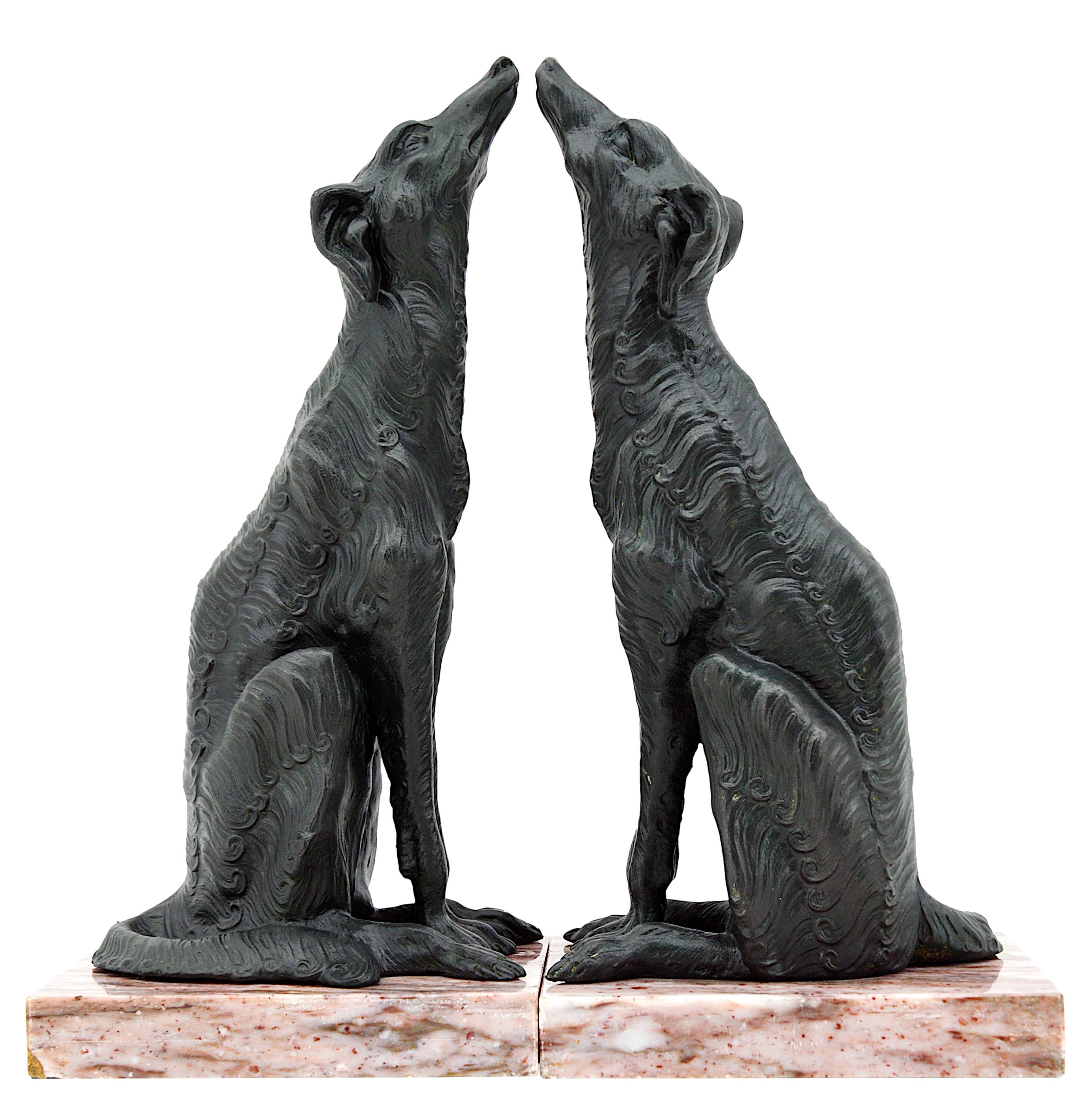 French Art Deco bookends, France, ca.1920s. Greyhounds. Patinated green bronze spelter dogs. Marble bases. Measures: height: 9.6