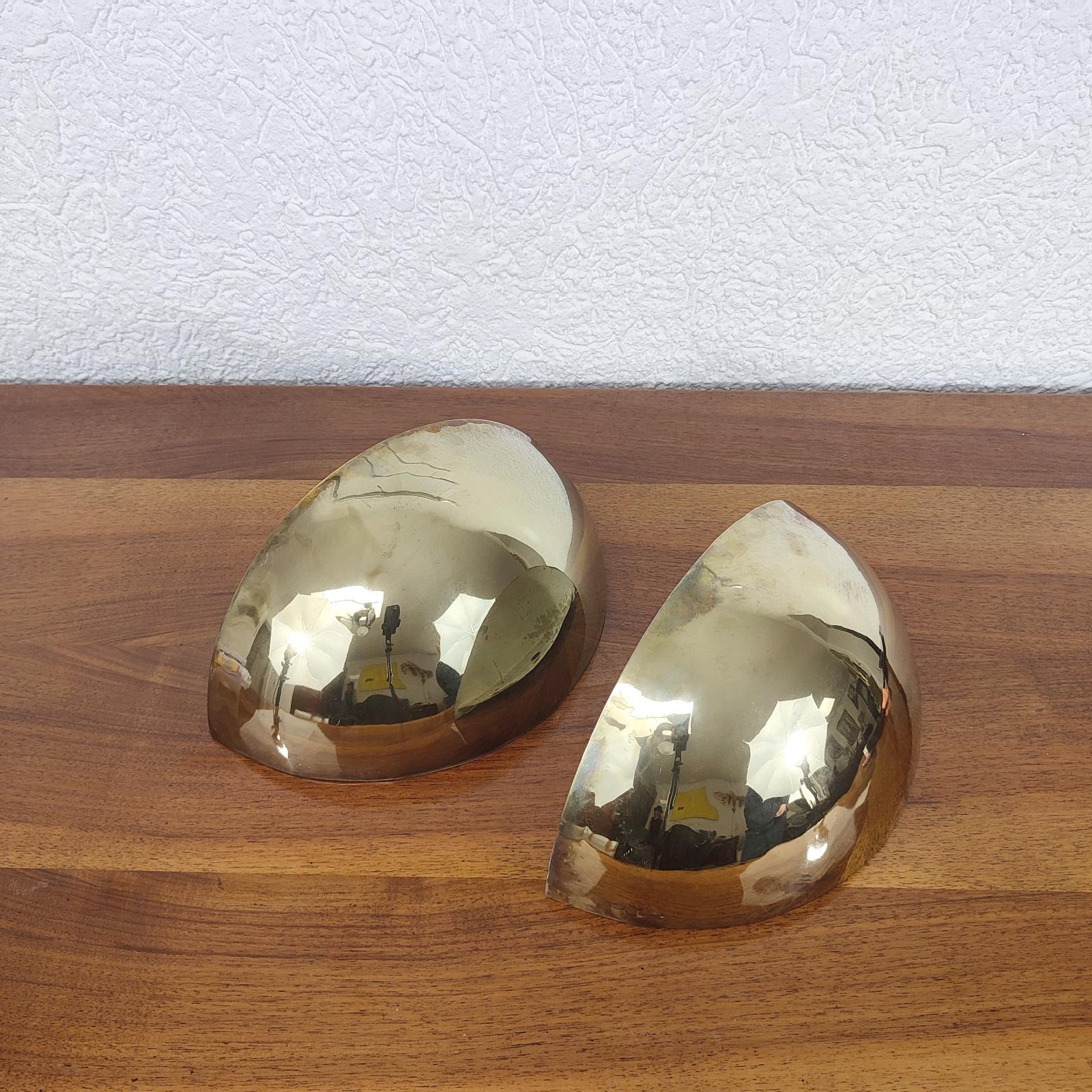 French Art Deco Half Moon Wall Lights, in the Tobia Scarpa's Quatro sconces style.
Made of brass-plated metal, they are in original condition, with traces of time, some bumps on sides, and patina.
Each marked 
