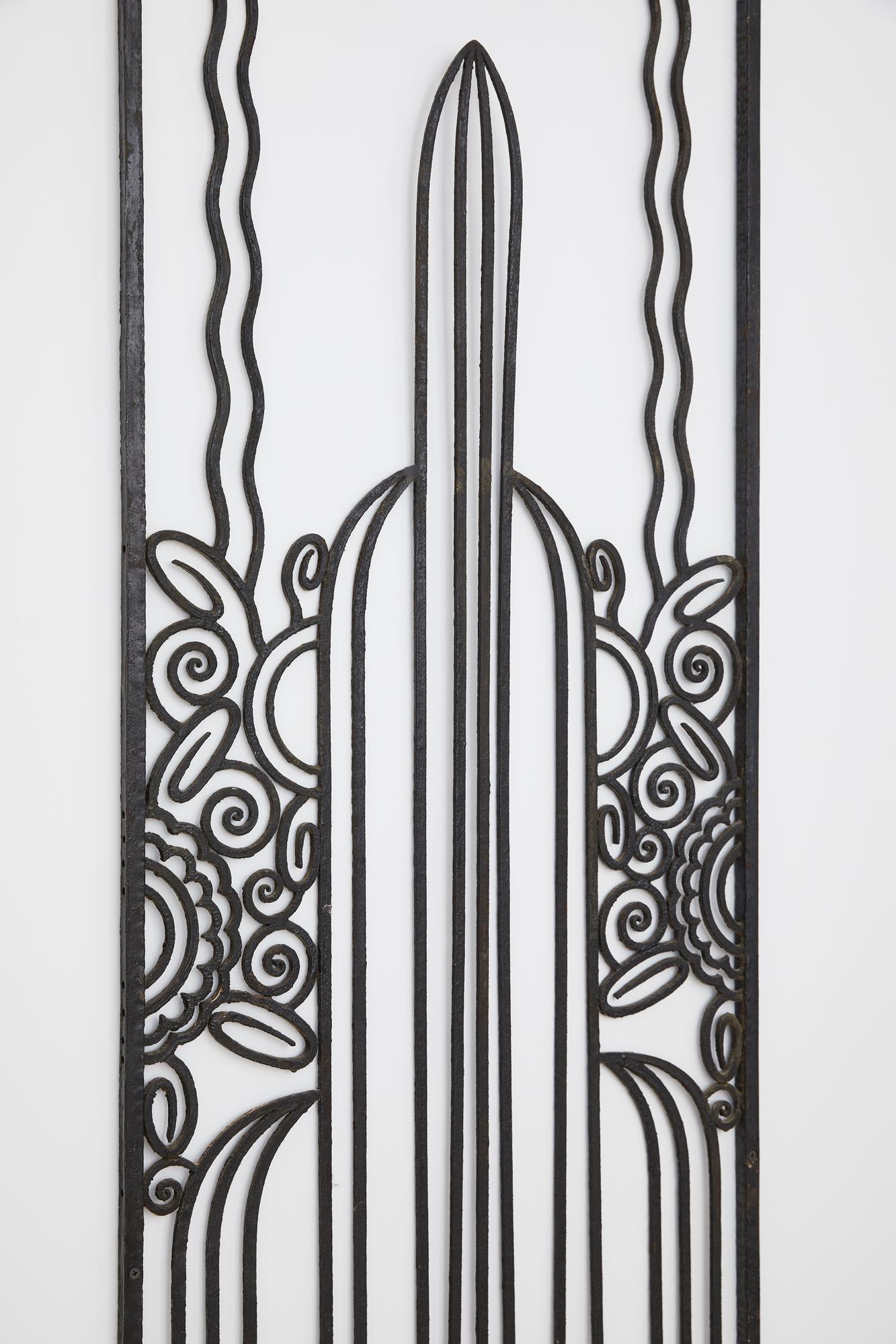 French Art Deco Hand Hammered Iron in the manner of Edgar Brandt, unsigned, circa 1930’s. This piece is a wonderful example of architectural salvage, constructed from hand wrought iron. It retains the original patina with areas of oxidation. This