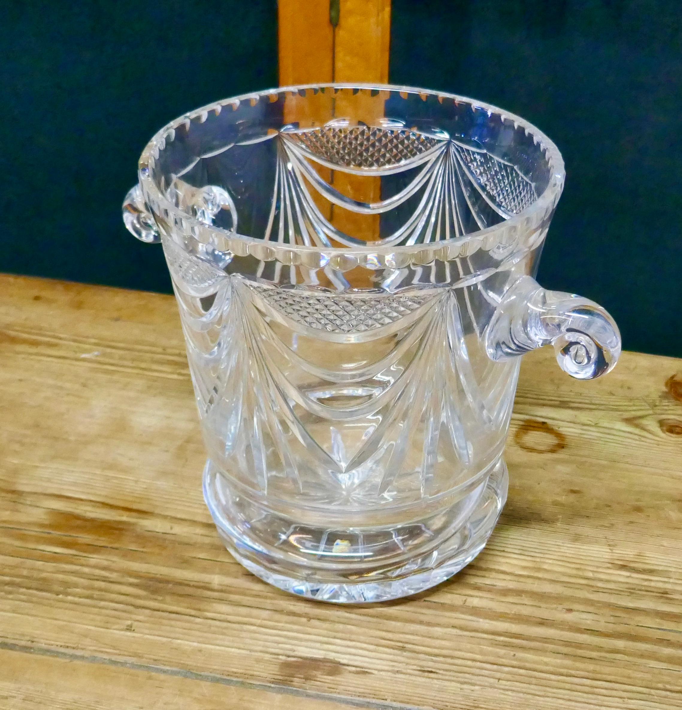 French Art Deco hand blown cut crystal Champaign ice bucket, wine cooler

A superb piece of artisan made crystal
The cooler or Ice bucket is used but it is otherwise perfect and has a beautiful ring when tapped
This design dates from the