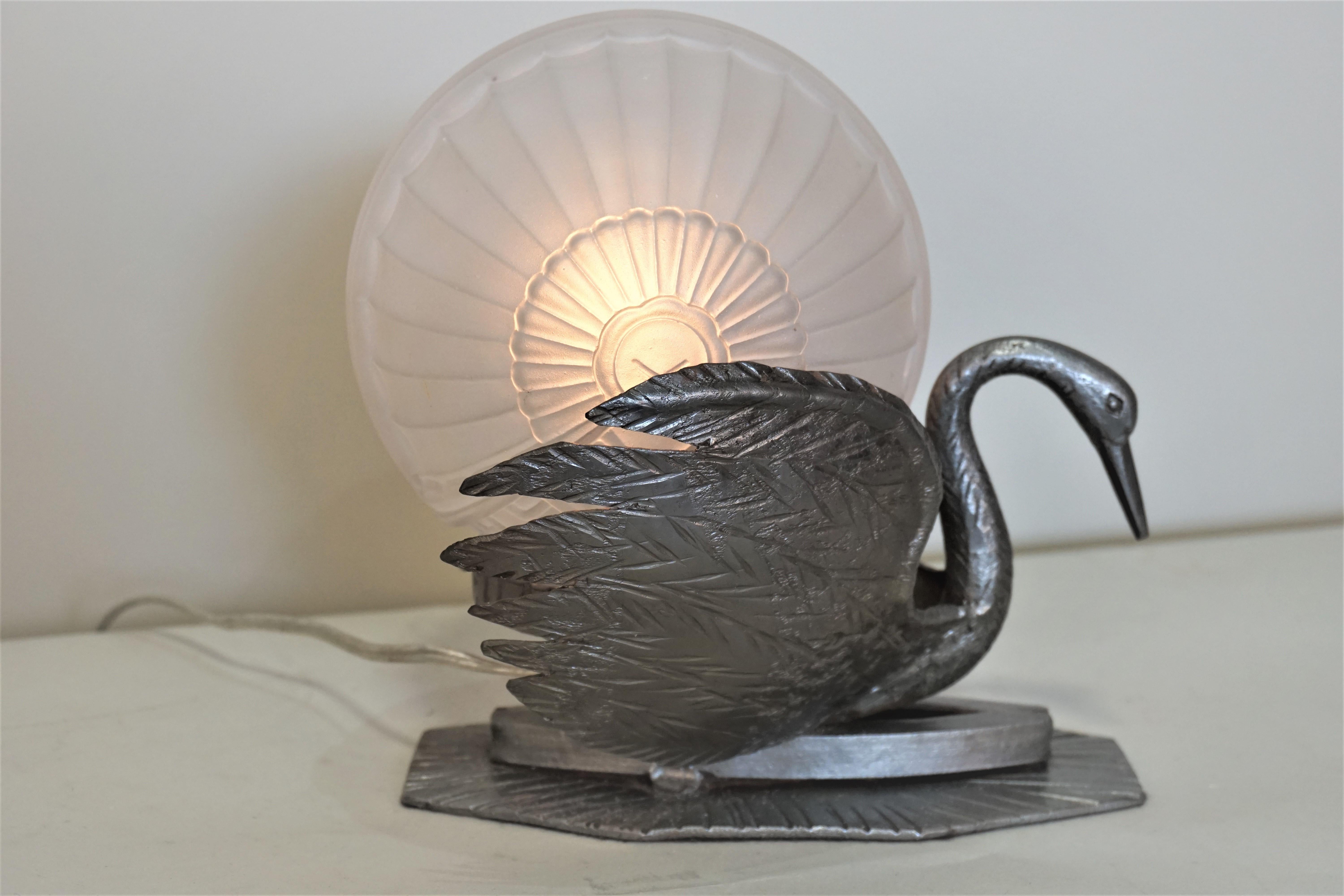 French 1920s handmade iron in shape of a swan with glass shade table lamp.