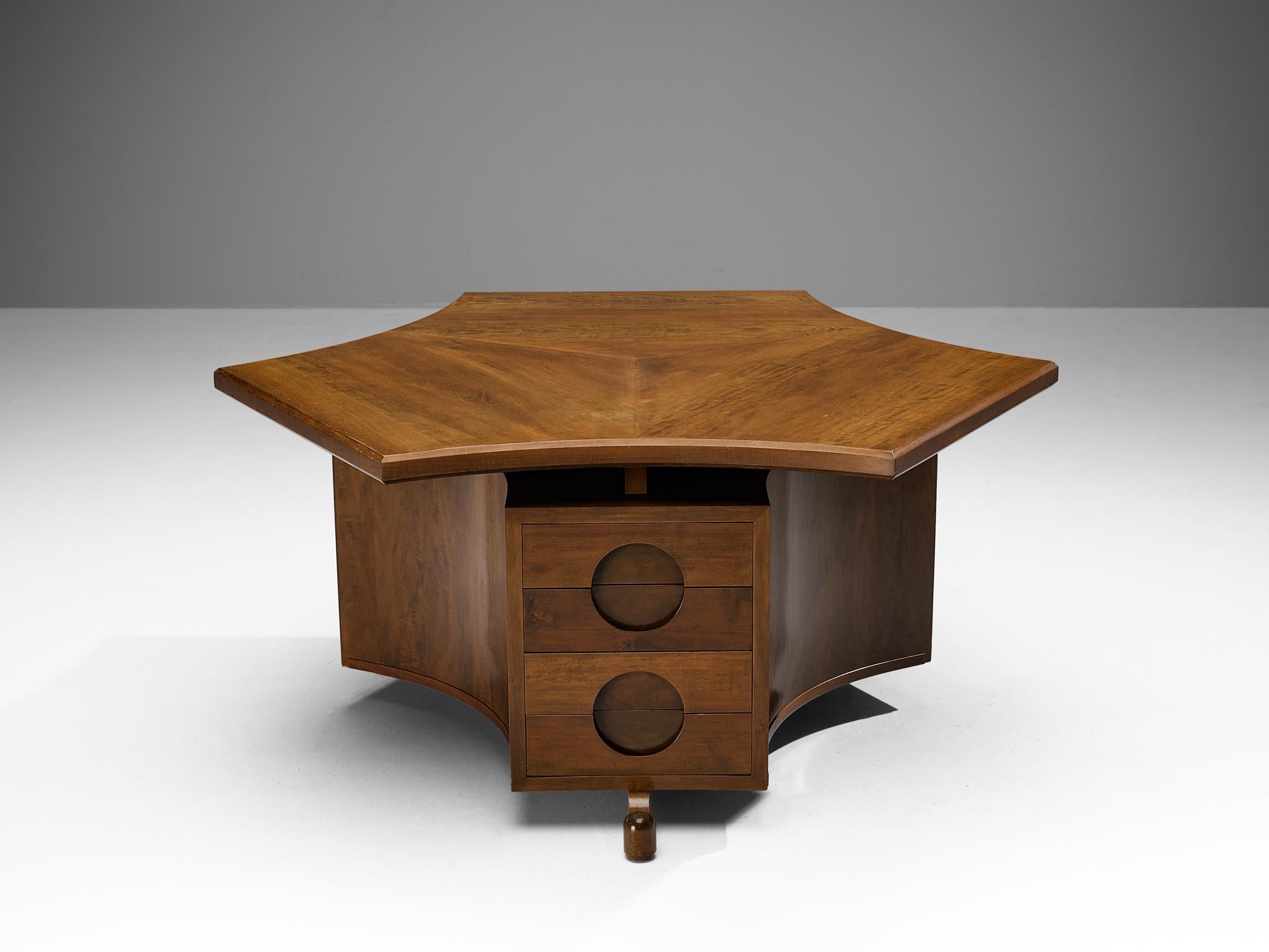 Freestanding desk, walnut, wood, France, 1940s

This hexagon shaped desk is made in France in the 1940s. The shapes used in the design of this desk make it special and rare to find. There is room for three separate work stations within this desks