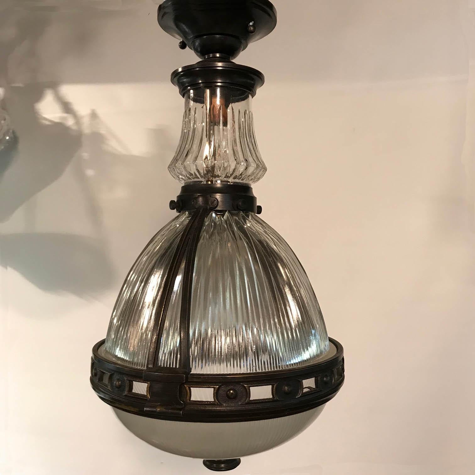 This is a rather rare example of its type both for its form but also for its condition which is good and entirely original. From the canopy to the finial Its all there, undamaged, and ready to hang. This fixture would enhance many 20th century