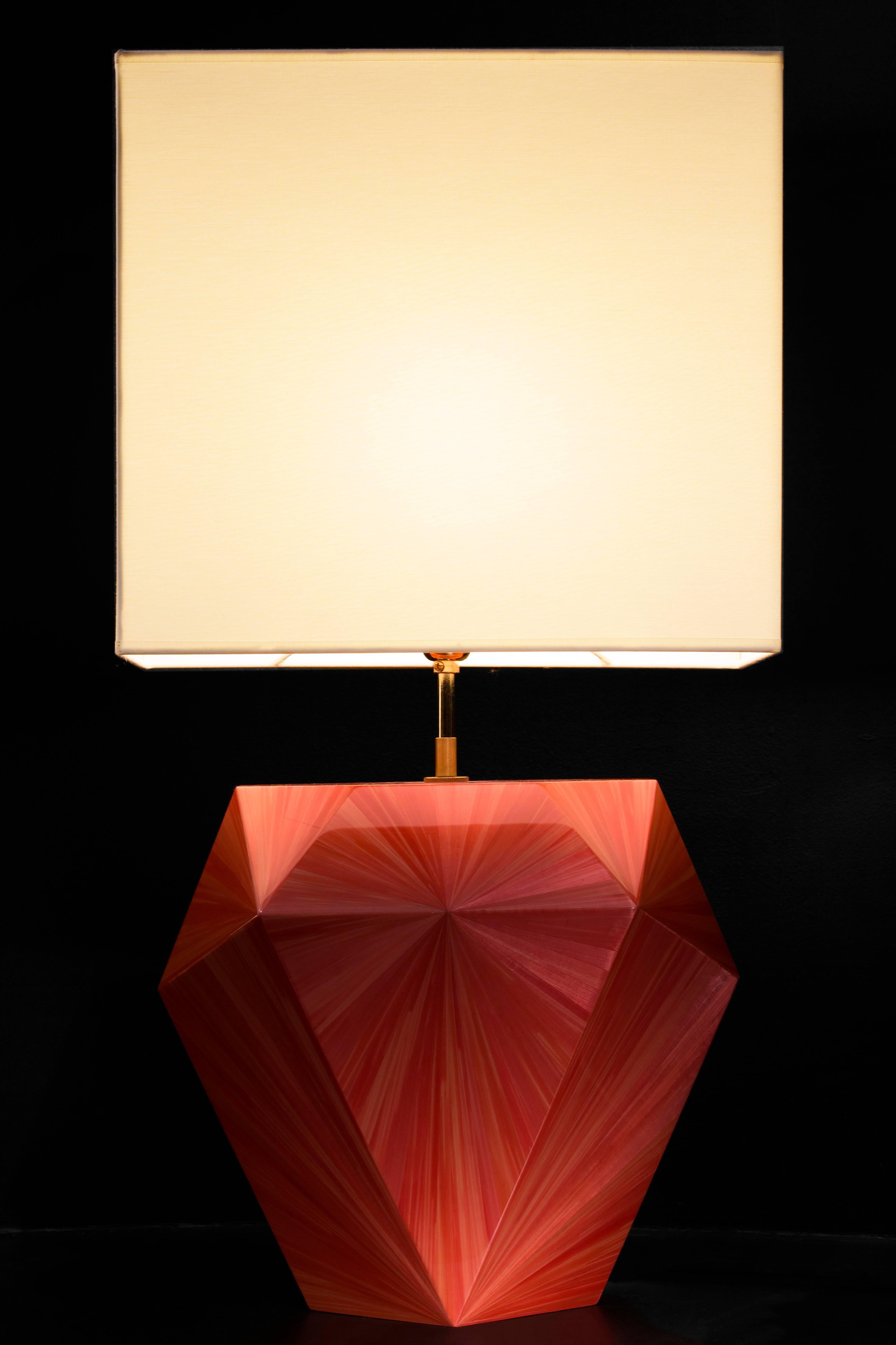 Ancient straw marquetry technique takes modern flair in our “Valerie” faceted table lamp in straw color Antiquaire. Features brass bulb holder and ivory silk cord. Ivory silk lampshade sold separately, €200. Can be purchased individually or as a