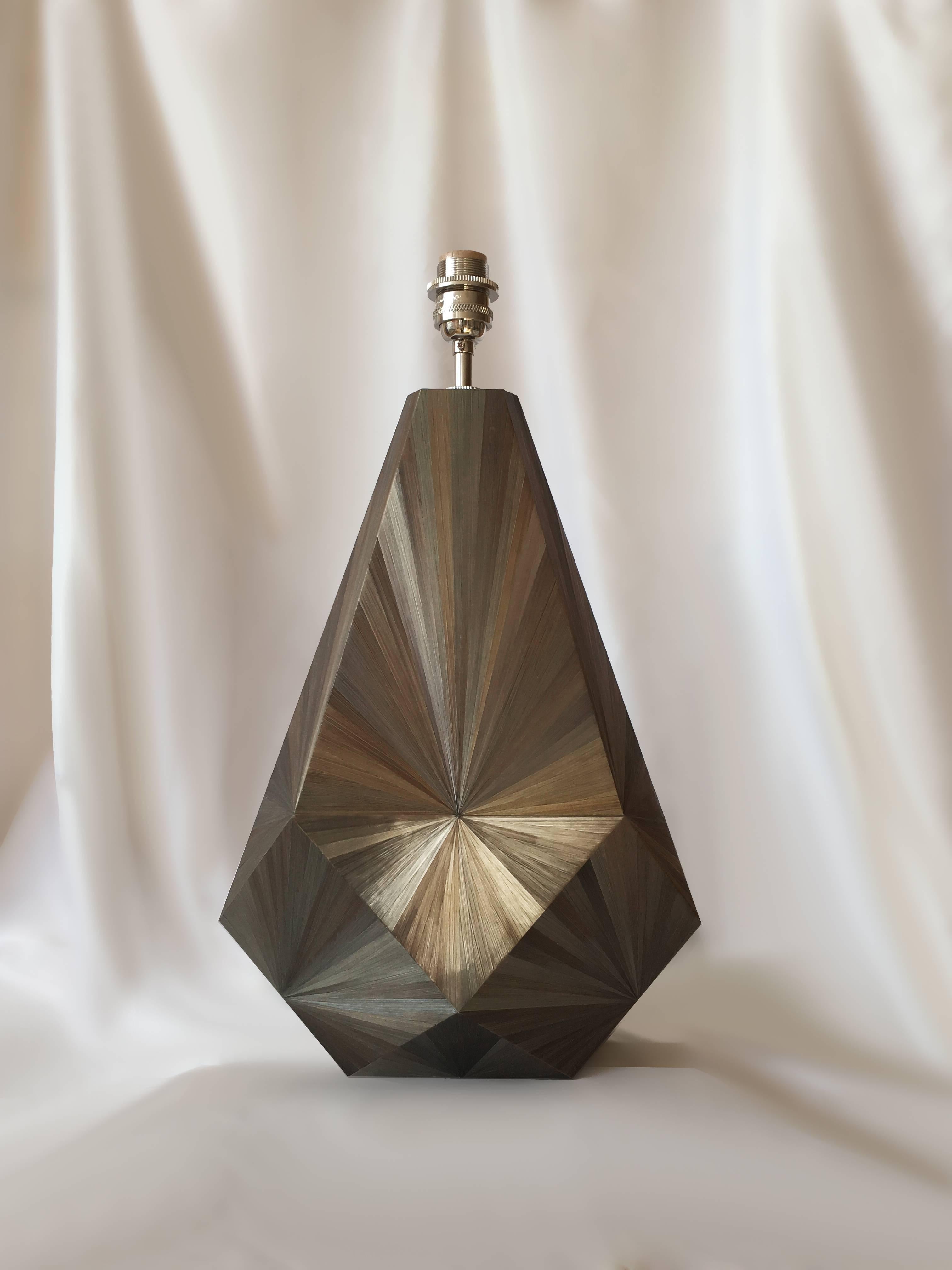 Ancient straw marquetry technique takes modern flair in our “Lise” faceted table lamp in color Grise Vert. Features brass bulb holder and silk cord. Ivory silk lampshade sold separately, €200
Can be purchased individually or as a pair. Bespoke