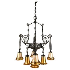 French Art Deco Iron Eight-Light Chandelier with Quezal Shades