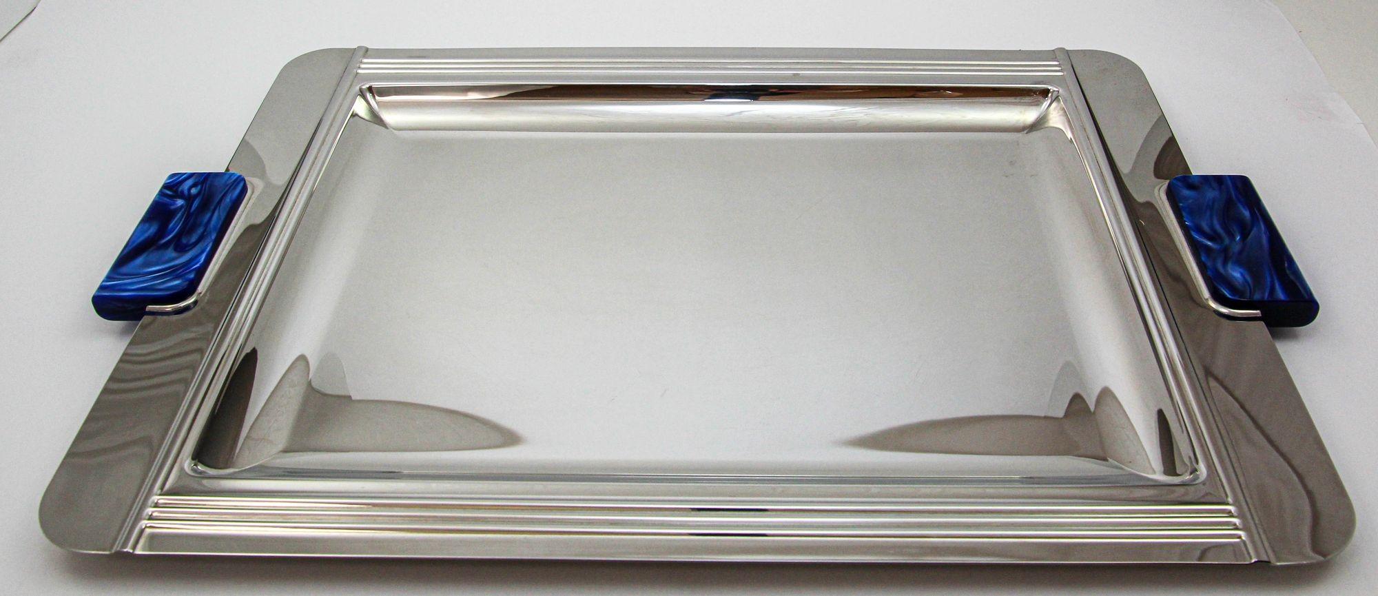 French Art Deco stainless steel serving tray by Couzon, France.
Vintage Jean Couzon Acier Inox 10/18 France Stainless Steel Serving Tray with Marbled Blue Resin Handles.
A beautiful large and heavy serving or barware tray.
This gorgeous polished